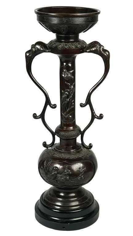 Japanese Meiji Period Bronze Vase with Birds: A finely crafted Japanese Meiji period bronze vase. The vase features elaborate reliefs depicting natural motifs, including birds and floral patterns, showcasing the high level of craftsmanship charac