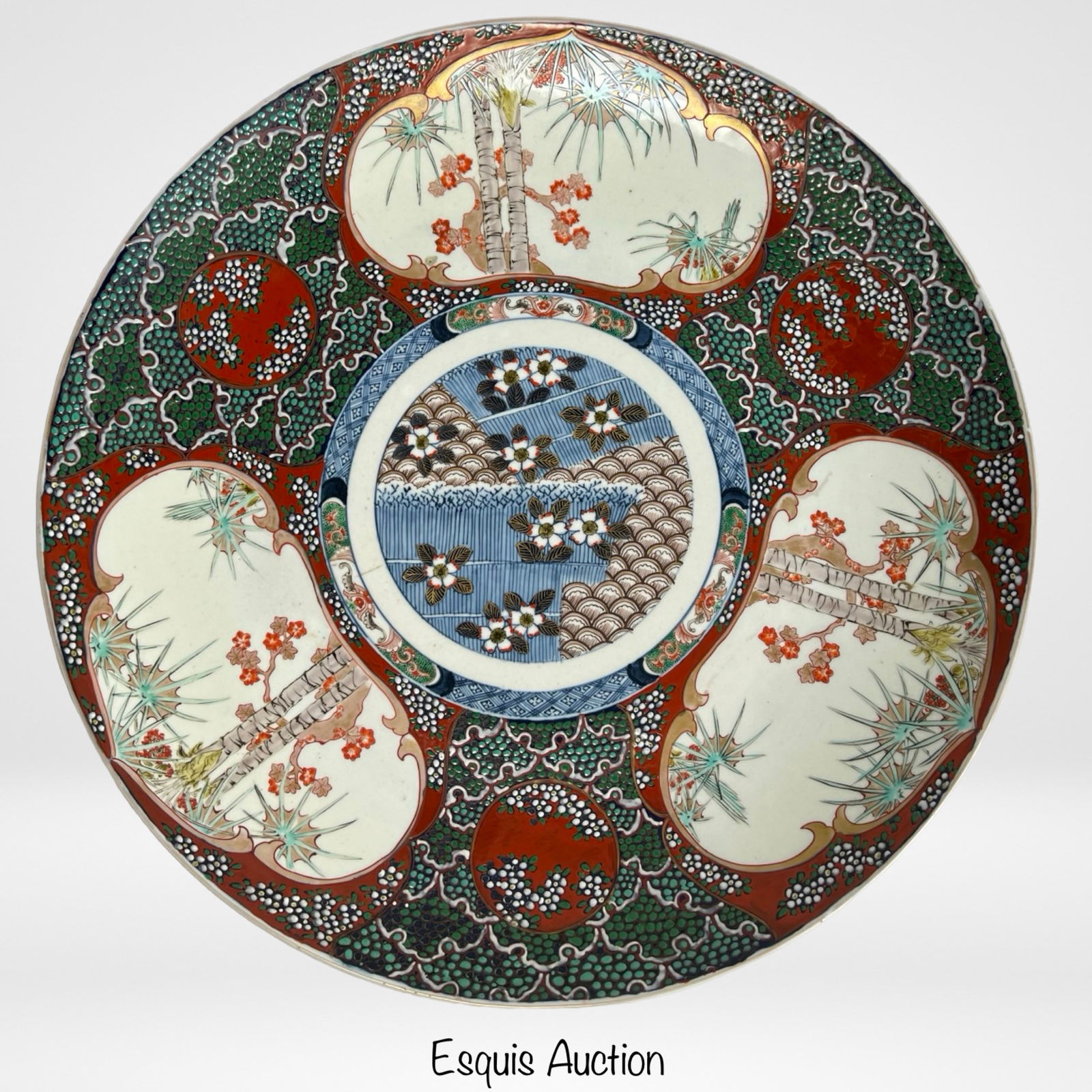 Japanese Meiji Era Imari Ware Porcelain Plate: Exquisite Japanese Imari Ware porcelain plate from the Meiji Era, featuring a vibrant and intricate hand-painted design. This stunning piece measures 12.3 inches in diameter and showcases a central la