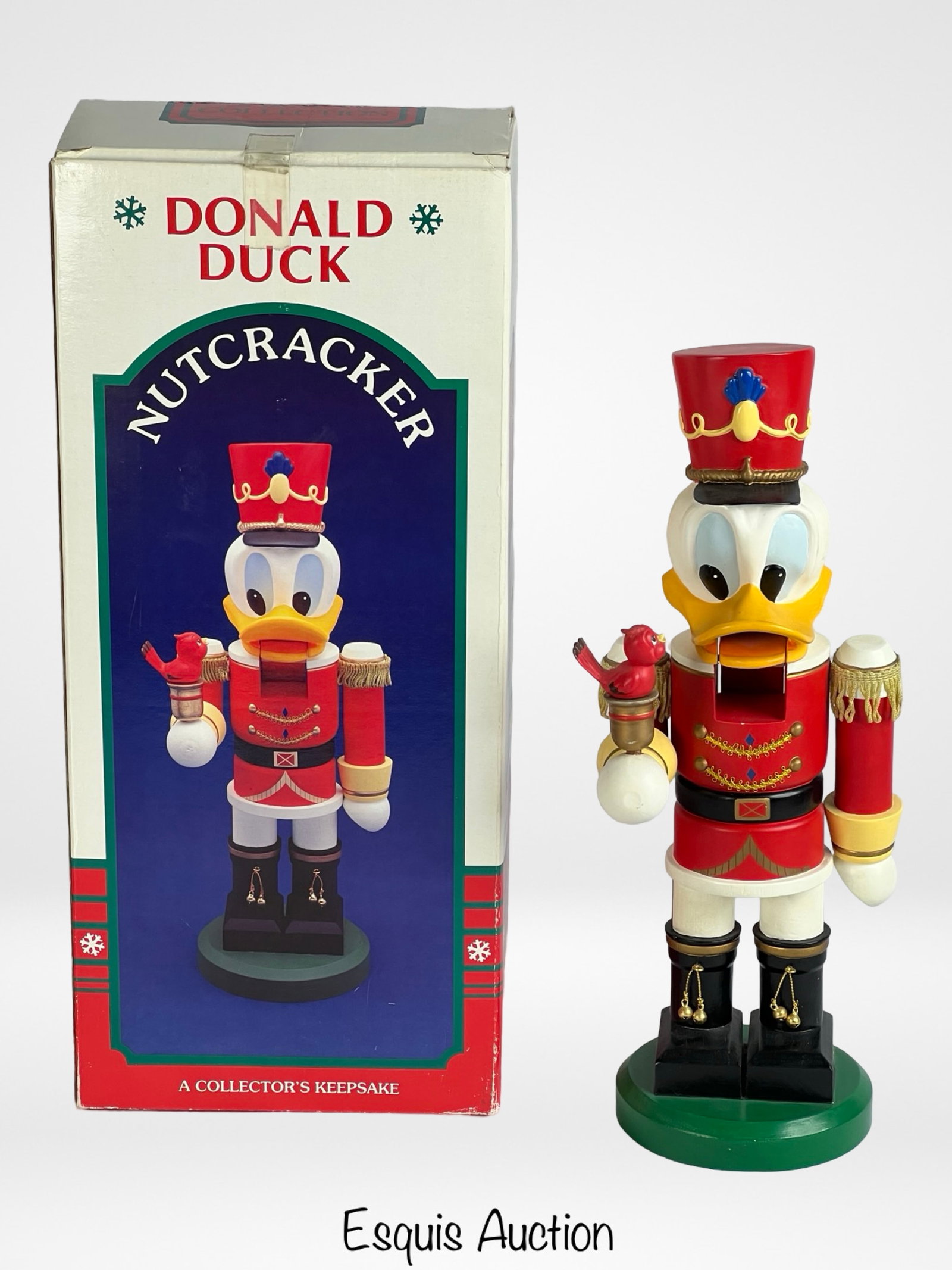 Disney's Donald Duck Nutcracker by Kurt S. Adler: This delightful Donald Duck Nutcracker, crafted by Kurt S. Adler for The Walt Disney Company, is a must-have collectible for Disney fans and holiday enthusiasts alike. Featuring Donald Duck in a charm