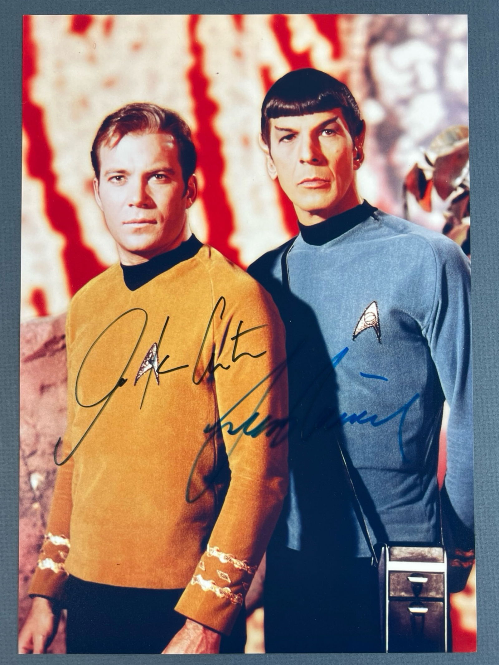 "Star Trek" Double Signed Photo- Shatner &: This classic Star Trek photograph features William Shatner as Captain James T. Kirk and Leonard Nimoy as Mr. Spock, the iconic duo from the original series. Both actors have signed this collectible, m
