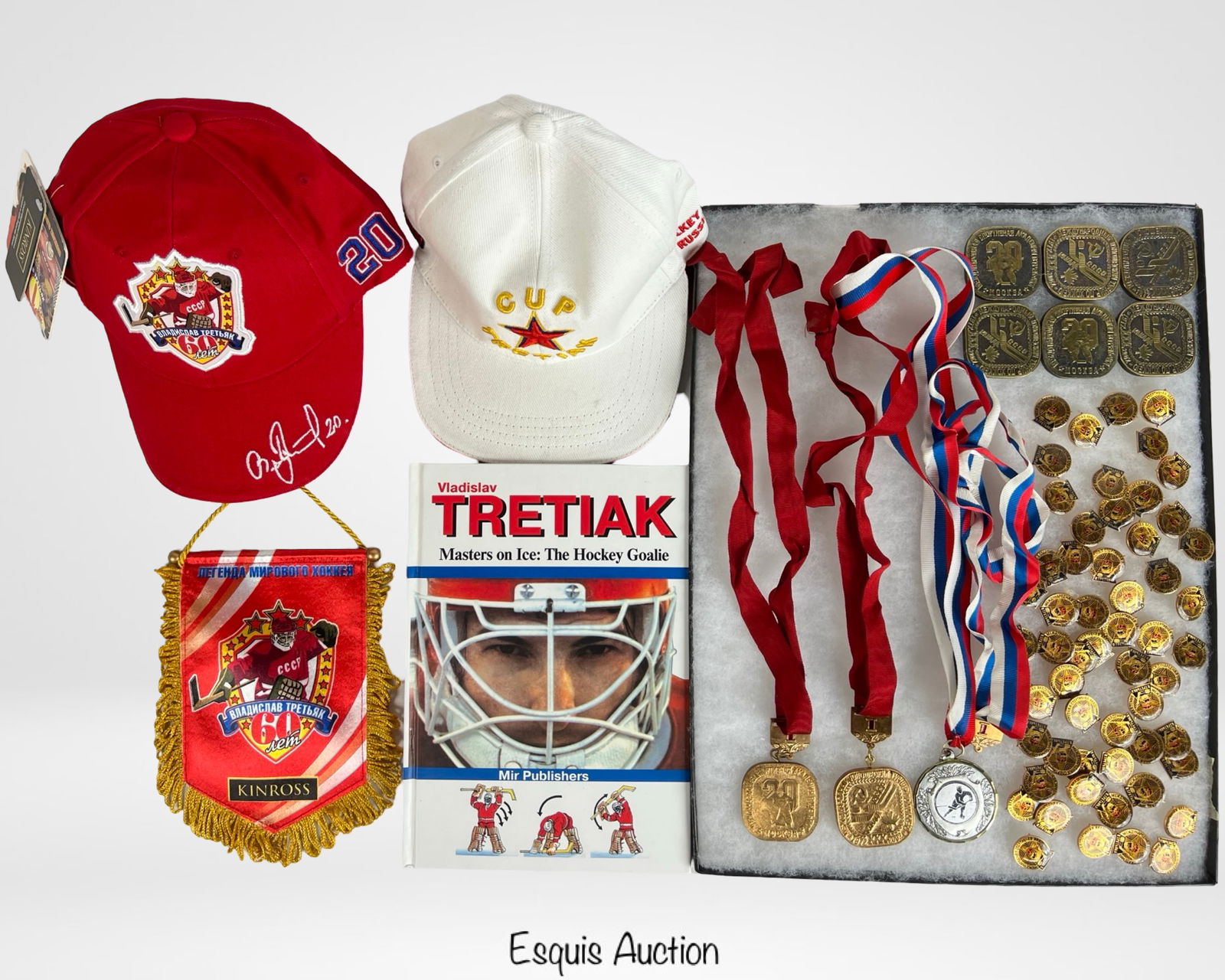 Vladislav Tretiak Russian Hockey Memorabilia Lot: Comprehensive Vladislav Tretiak memorabilia collection, celebrating the legendary Russian hockey goaltender. This lot includes: Autographed Book: "Masters on Ice: The Hockey Goalie" by Vladislav Treti
