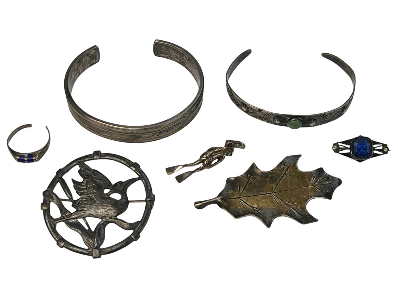 Group of Vintage Lady's Sterling Silver Jewelry: Group of Vintage Lady's Sterling Silver Jewelry including Cuff Bracelets, Brooches, Pendant & Ring. Bracelets are 2 1/2" x 2" & 2 1/4" x 1 3/4". Good overall condition, ring is cut on verso.