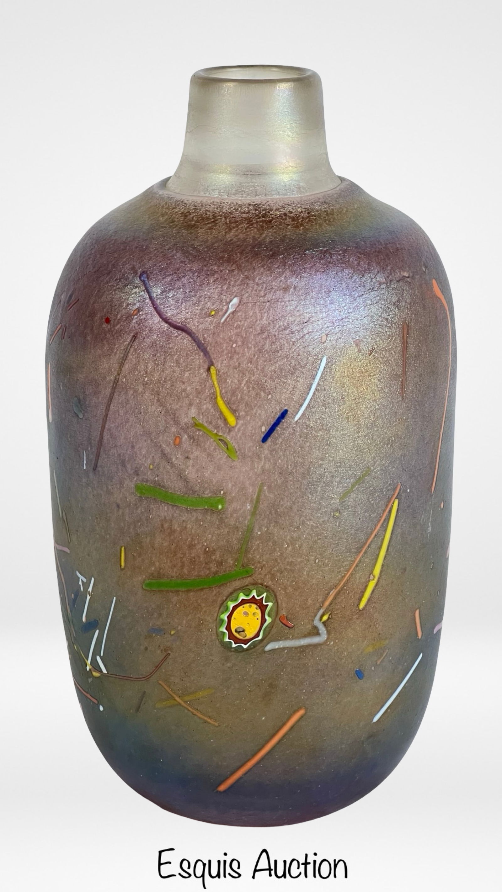 Kosta Boda "Tornado" Vase by Bertil Vallien: This is a stunning Kosta Boda art glass vase designed by Bertil Vallien, titled "Tornado." The vase showcases Vallien's mastery in glass artistry, featuring a textured iridescent surface with vibrant