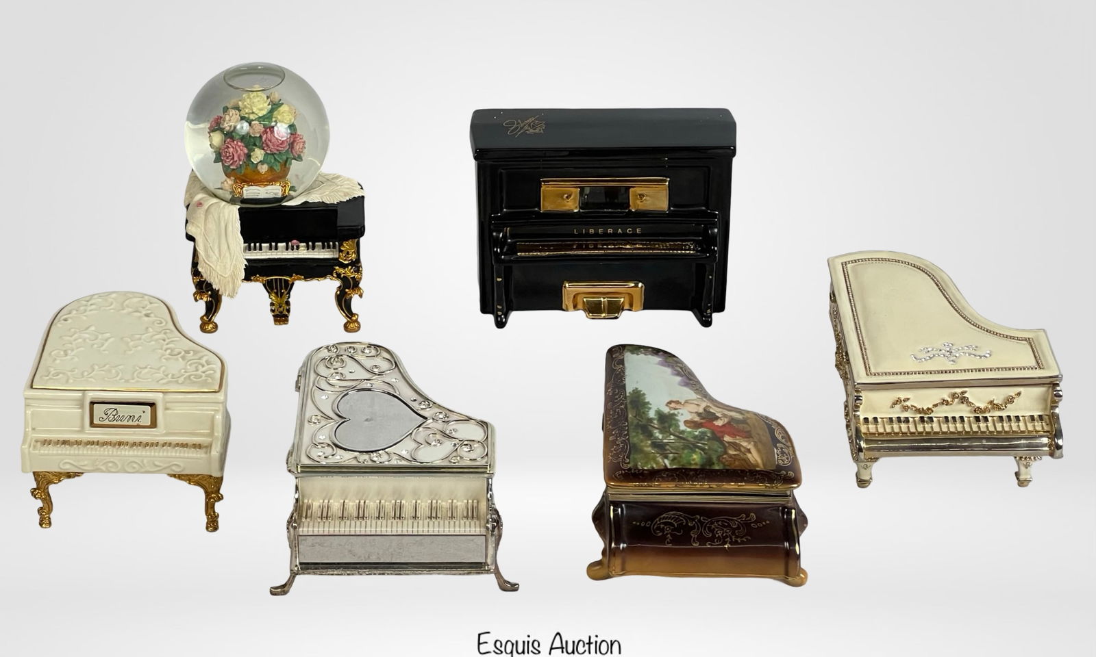Collection of Piano Trinket Boxes and Music Boxes: A delightful collection of piano-themed music boxes, each intricately designed with unique materials including porcelain, metal, and glass. This set features grand and upright pianos adorned with gold