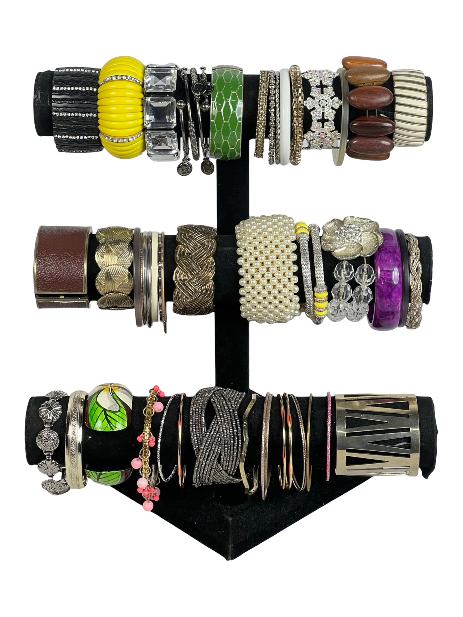 Assorted Collection of Ladies' Bracelets: A stylish assortment of ladies' bracelets in various designs and materials, perfect for accessorizing any outfit.This collection highlights a variety of themes, from bold and whimsical to elegant and 