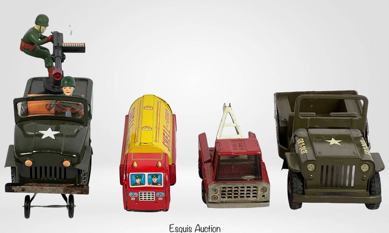 Vintage Tin & Pressed Steel Toy Vehicle Collection: diverse collection of four vintage toy vehicles, including both tin litho and pressed steel designs. The lot features: Buddy L Red Tow Truck - A classic mid-century pressed steel tow truck with a red