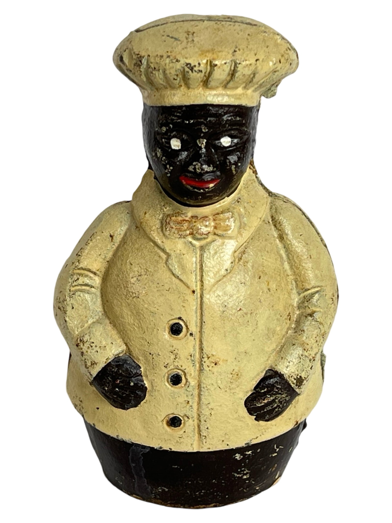 Vintage Black Americana Jolly Chef Cast Iron Bank: This vintage Jolly Chef cast iron coin bank stands 5 inches tall and features a hand-painted figure dressed in a cream-colored chef's uniform with black accents and a bow tie.