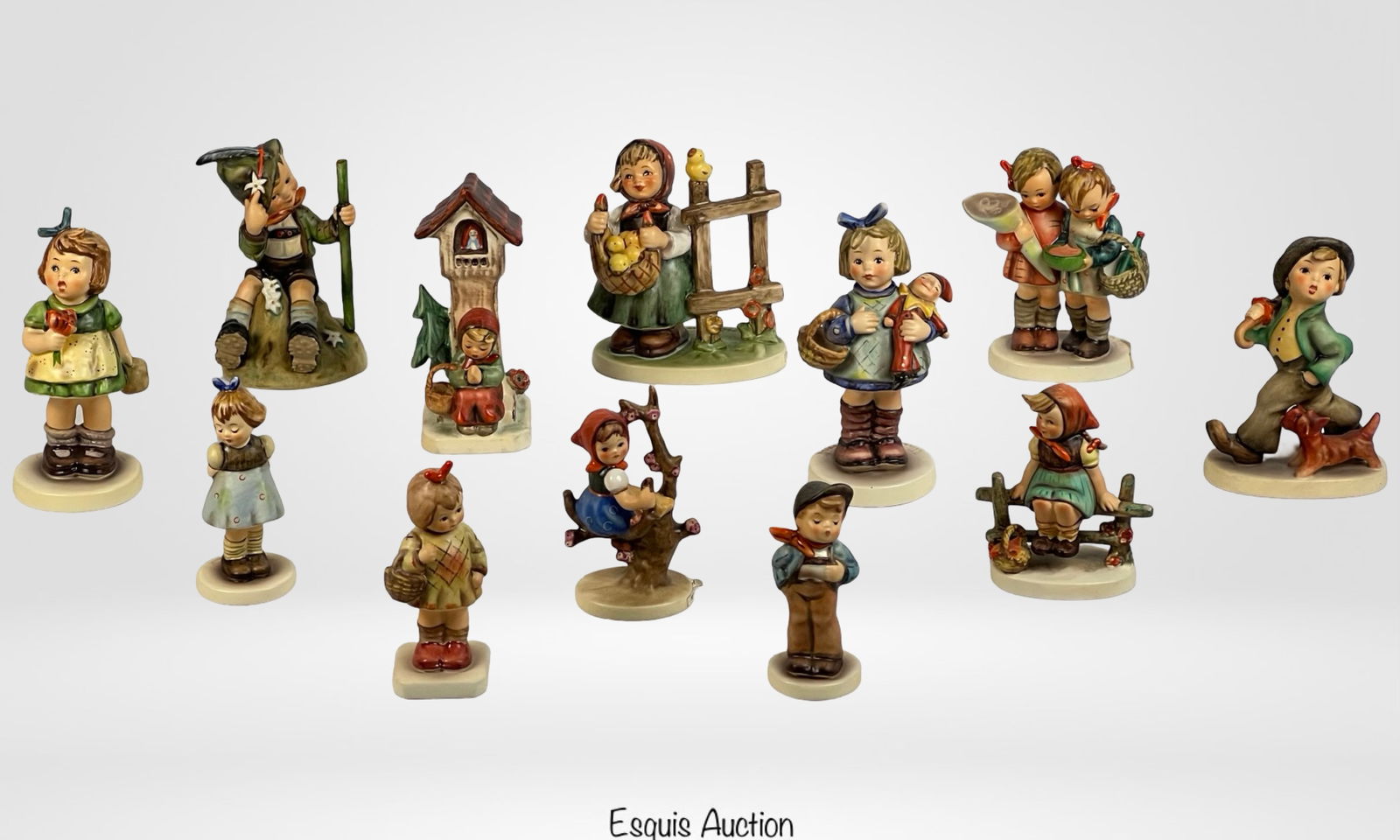 Hummel Goebel Porcelain Figurines Collection: Charming collection of Hummel Goebel porcelain figurines, each meticulously crafted to depict endearing scenes of childhood. The figurines range in height from 4 to 5 3/4 inches. All are in good condi
