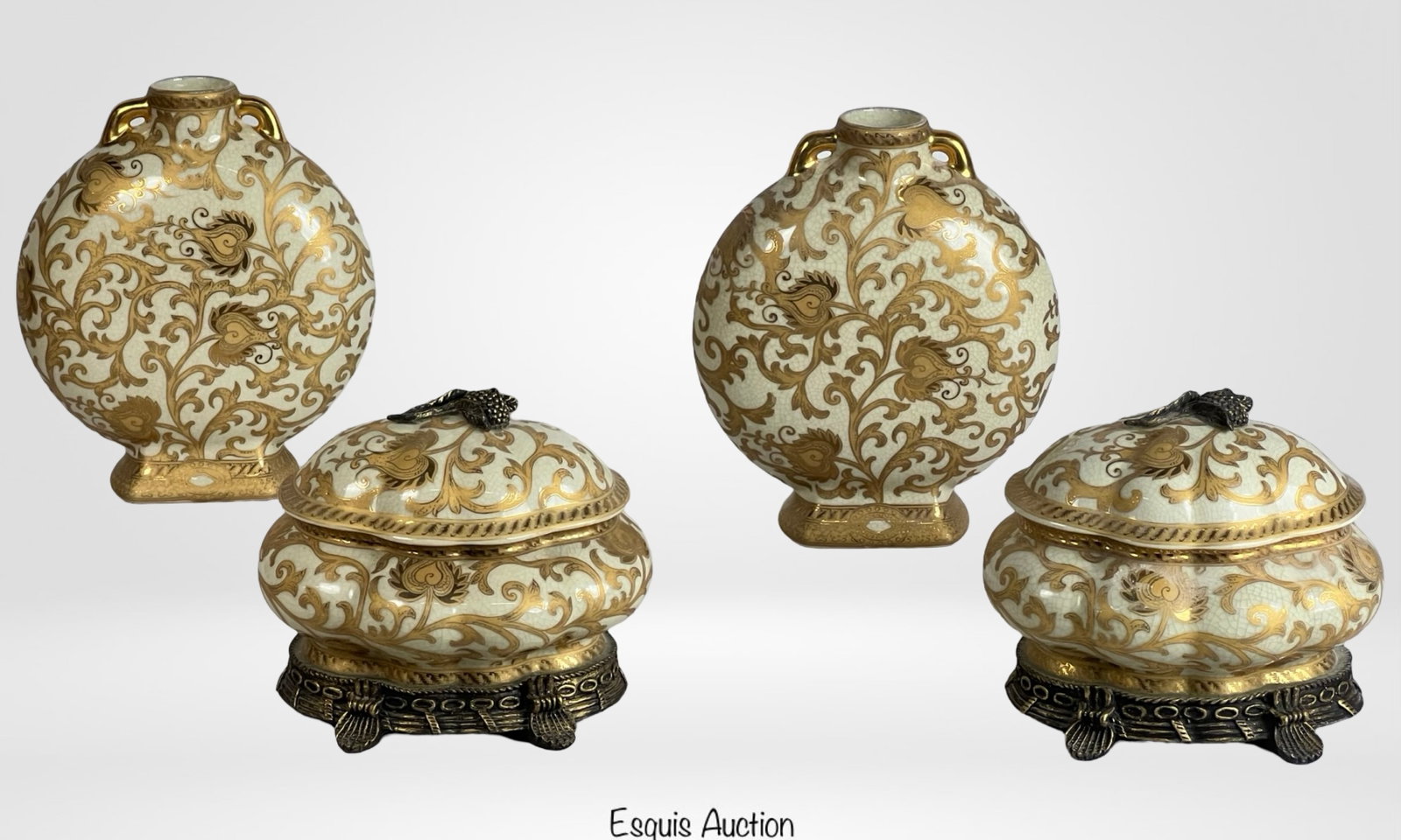 Elegant Gold & Ivory Porcelain Vases & Lidded Box: This stunning four-piece set includes two intricately designed porcelain vases and two matching lidded boxes, all adorned with an elegant gold and ivory floral motif. The vases feature a striking moon