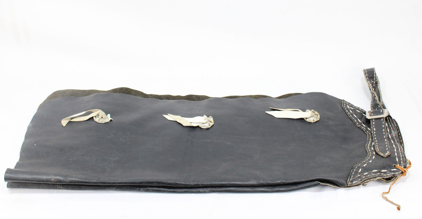 Vintage Leather Cowboy/ Biker Batwing Chaps: Vintage leather cowboy batwing chaps, featuring sturdy leather construction and traditional tie fastenings. Ideal for horseback riding or Western-themed events, these chaps are designed for comfort an