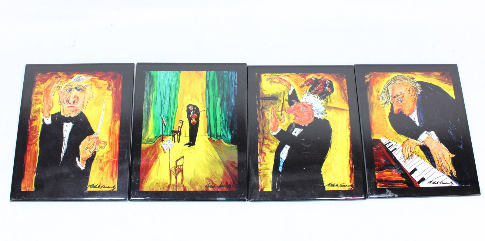 By Michele Kennedy Set of four whimsical musician-themed artwork tiles. (1 of 5)