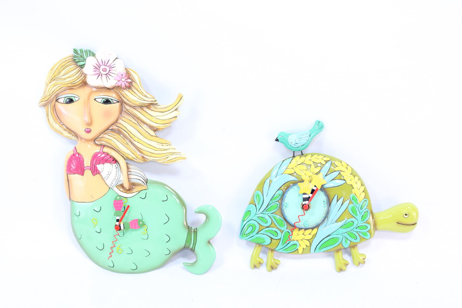 Allen Design Studio Colorful whimsical wall clocks. (1 of 3)