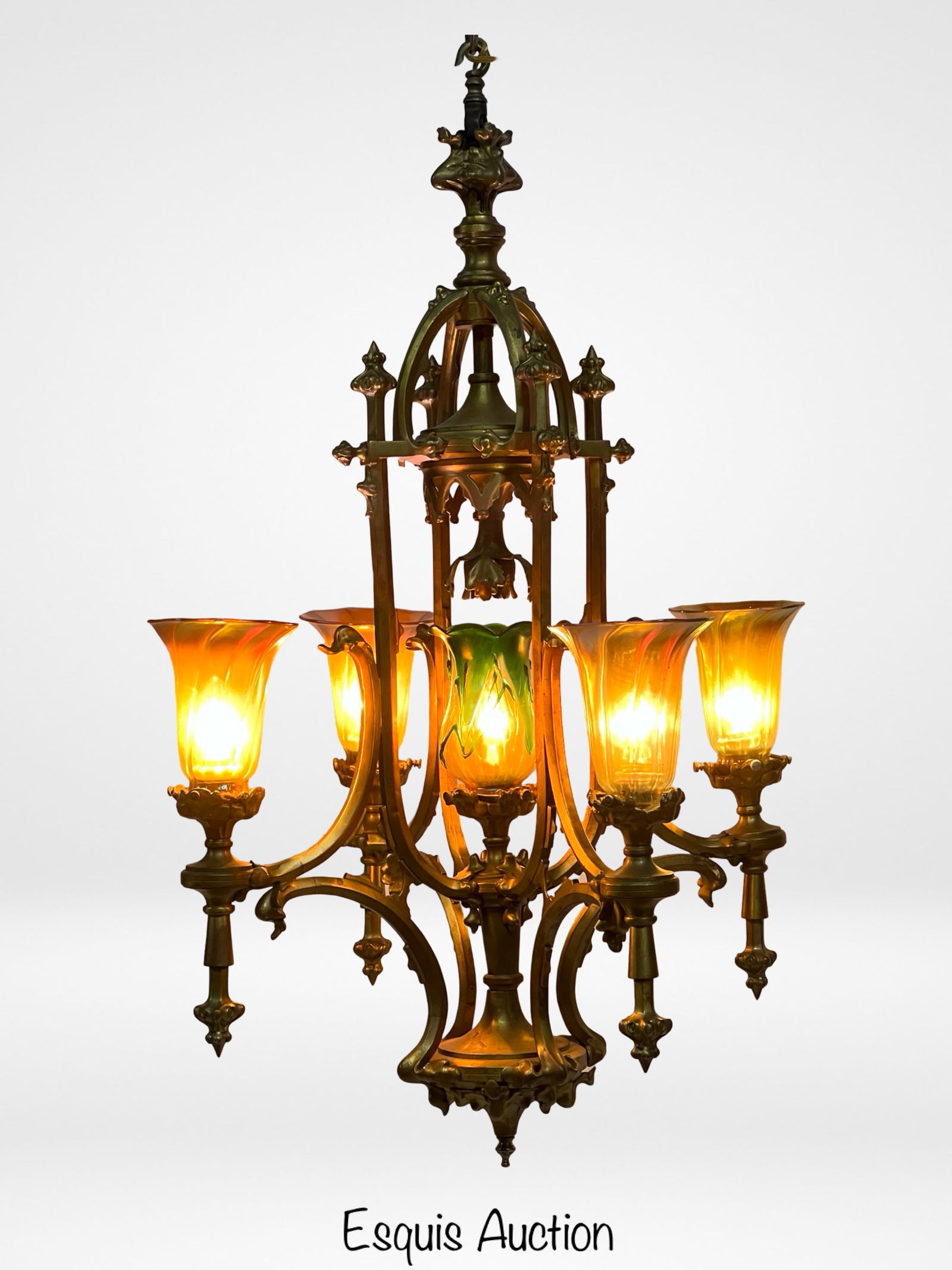 Antique Art Nouveau Bronze Chandelier Aurene Glass: Elegant and intricately designed, this Art Nouveau chandelier from the 1920s features a finely cast bronze frame with ornate detailing and a gracefully arched structure. The chandelier is adorned with