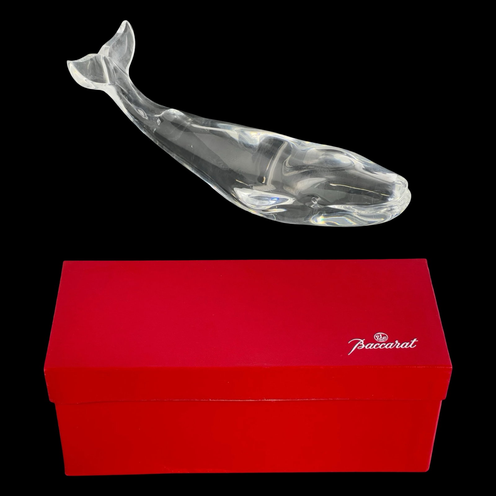 Baccarat- French Art Crystal Whale Sculpture: Elegant Baccarat crystal whale figurine, measuring 9" in length. Crafted with Baccarat's signature precision, the piece showcases a sleek, fluid form with exceptional clarity and light reflection. A r