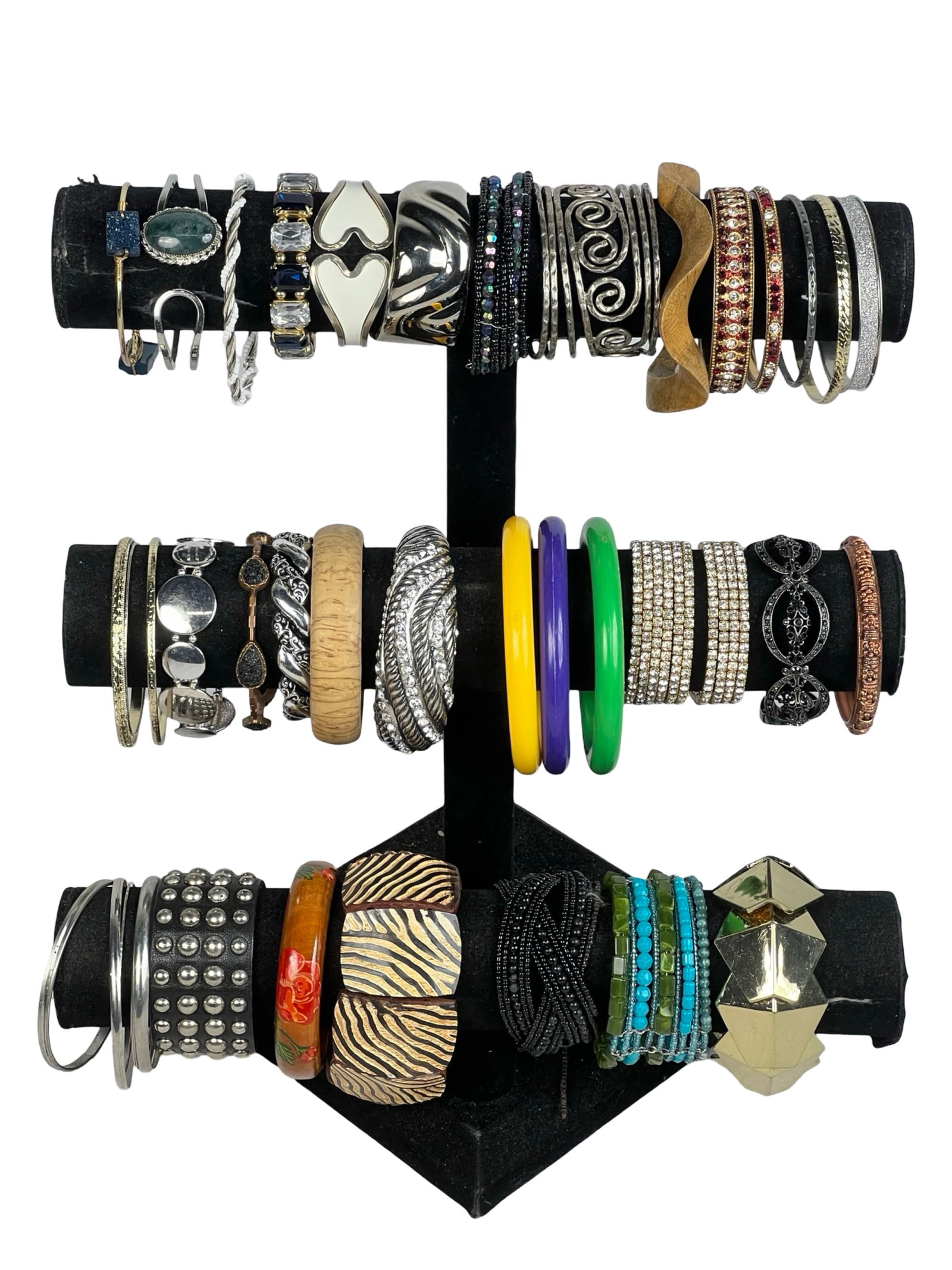 Collection of Lady's Bracelets: Explore a diverse assortment of bracelets, each one offering its own unique style and charm. Display stands are not included.