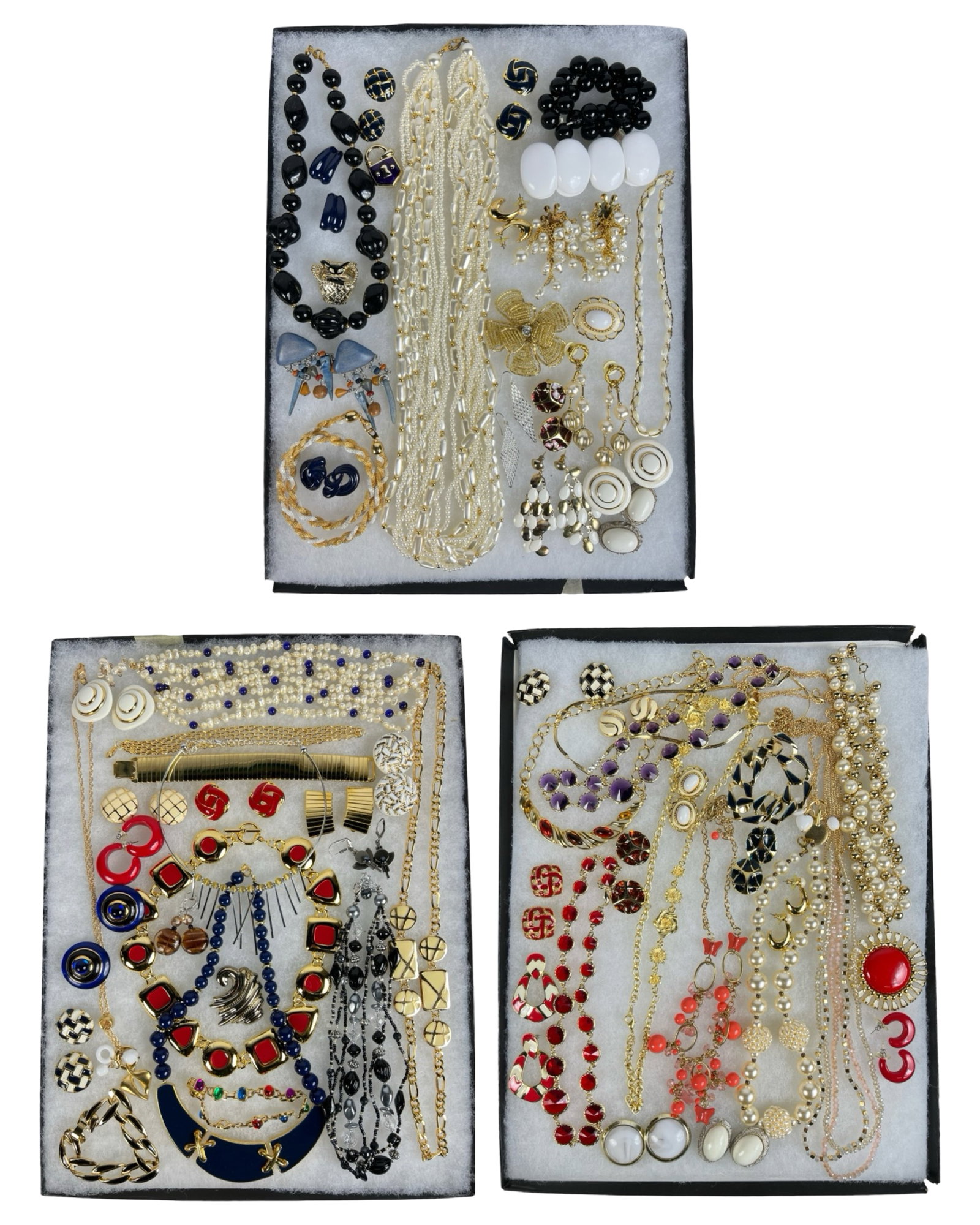 Assortment of Costume Jewelry - Sparkling Variety: Elevate your style with this dazzling Assortment of Costume Jewelry. Bursting with variety, this collection features an array of necklaces, earrings, bracelets, and more, each piece designed to add a 