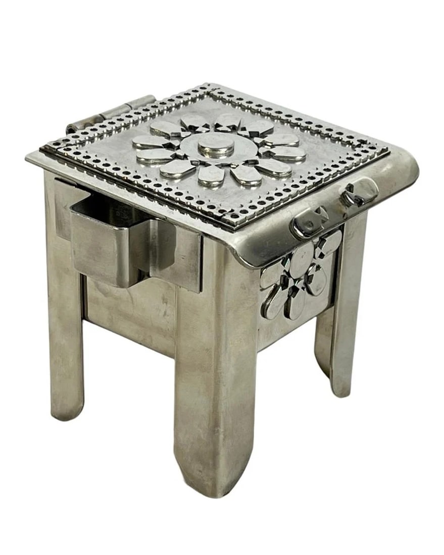 Stanley Szwarc Stainless Steel Jewelry Box: A handcrafted stainless steel jewelry box by Stanley Szwarc (Polish-American, 1928-2011), featuring intricate floral and geometric cutwork designs. This functional yet artistic piece includes a hinged