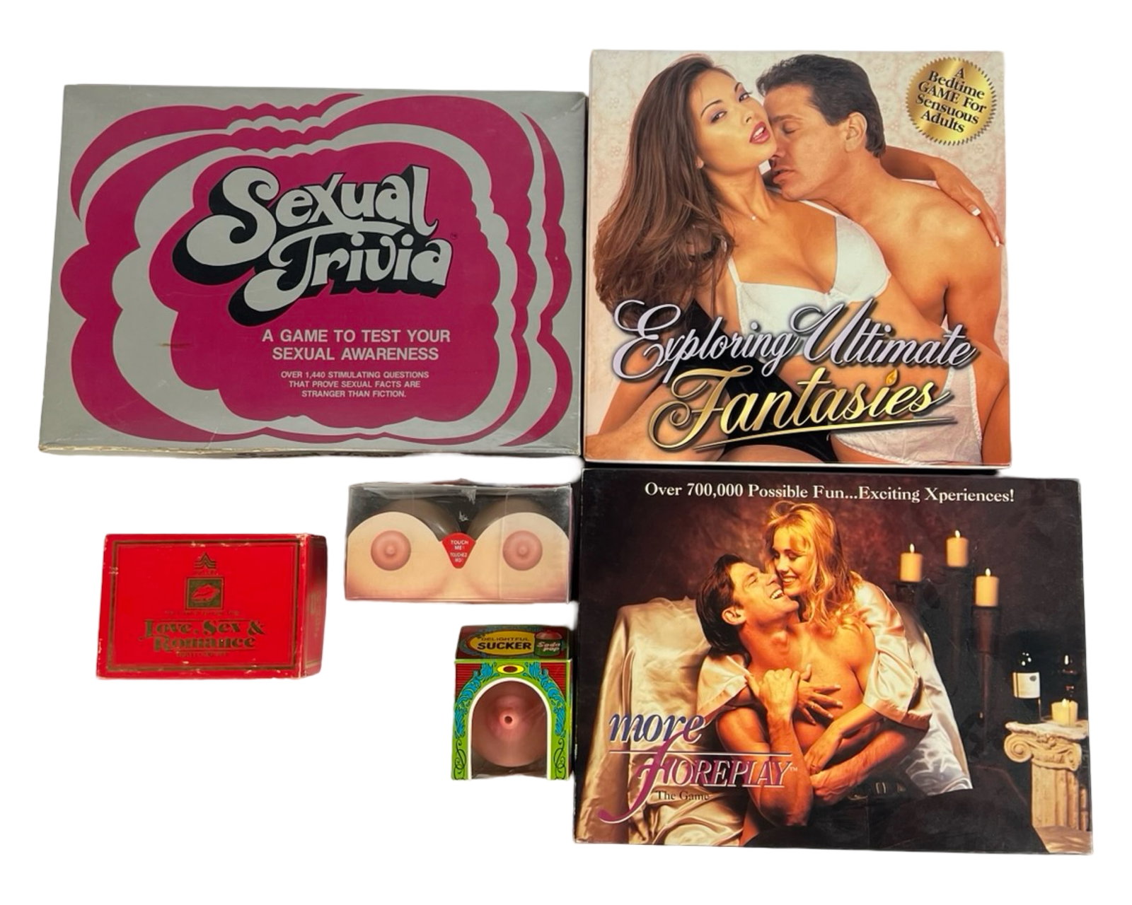 Vintage Adult Erotic Board Games & Trivia: Lot of vintage adult-themed board games and trivia sets, including: Sexual Trivia - A game to test your sexual awareness, featuring over 1,400 stimulating questions. Exploring Ultimate Fantasies - A r