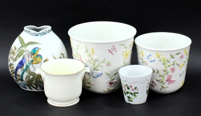 Set Of Planters- Mikasa & More: The set is highlighted by a Mikasa planter with 24-karat gold accents, elegantly crafted in Narumi, Japan. Each piece, ranging from planters to cups, showcases intricate floral and bird motifs, encaps