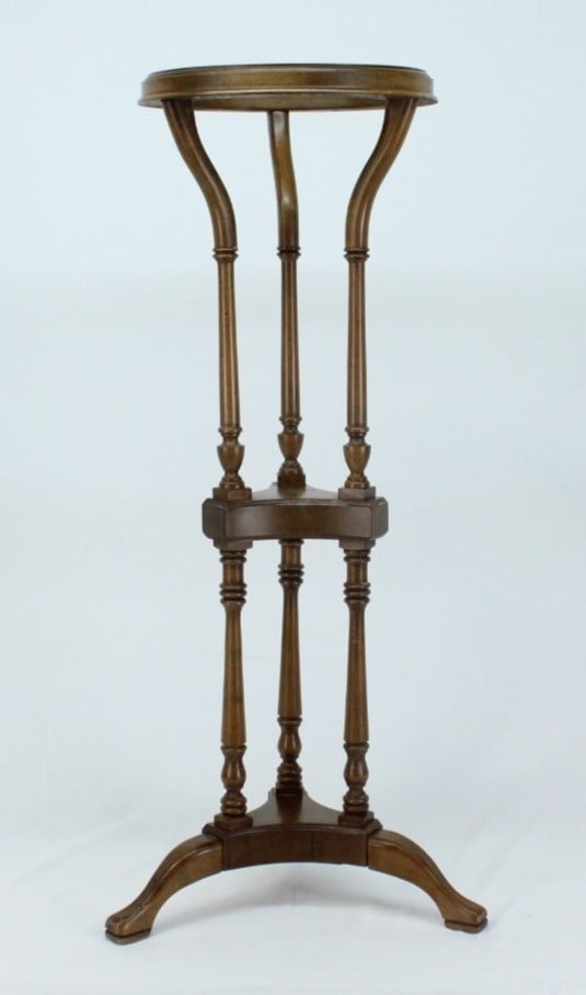 Butler Specialty Wooden Plant Stand: Elegant Butler Specialty wooden plant stand, designed with graceful spindle legs and a tiered structure, perfect for displaying a flower pot or decorative accent piece. The rich wood finish and tradit