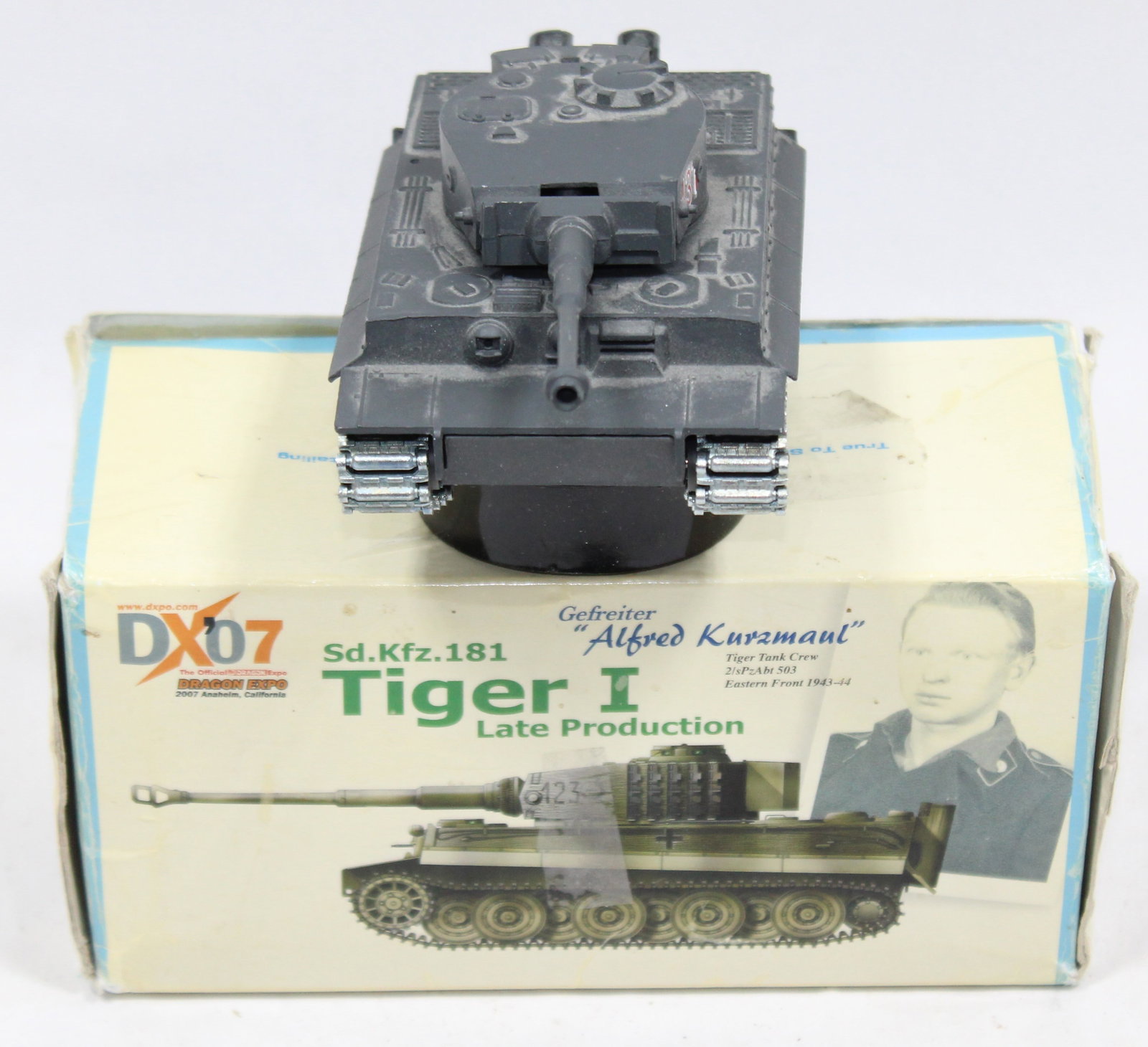DX07 Dragon Expo Tiger I Die-Cast WWII Tank Model: Highly detailed DX07 Dragon Expo Tiger I late production model featuring the iconic WWII tank. Comes with the original box depicting "Gefreiter Alfred Kurzmaul" of the Tiger Tank Crew, 2nd SS Panzer C
