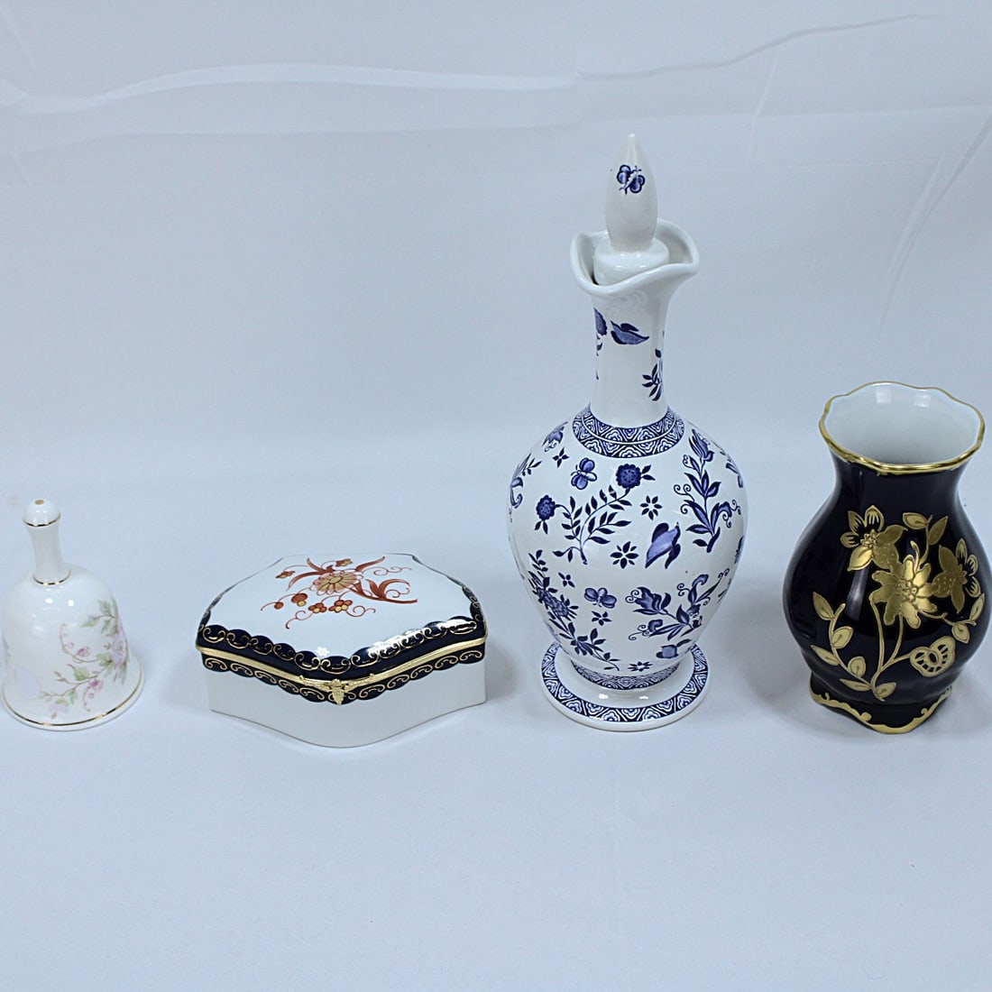 Collection of Fine Porcelain & Bone China Decoratives: A refined assortment of fine porcelain and bone china pieces, including: Coalport Limited Edition Blue & White Decanter & Stopper (England): A beautifully crafted decanter featuring intricate blue flo