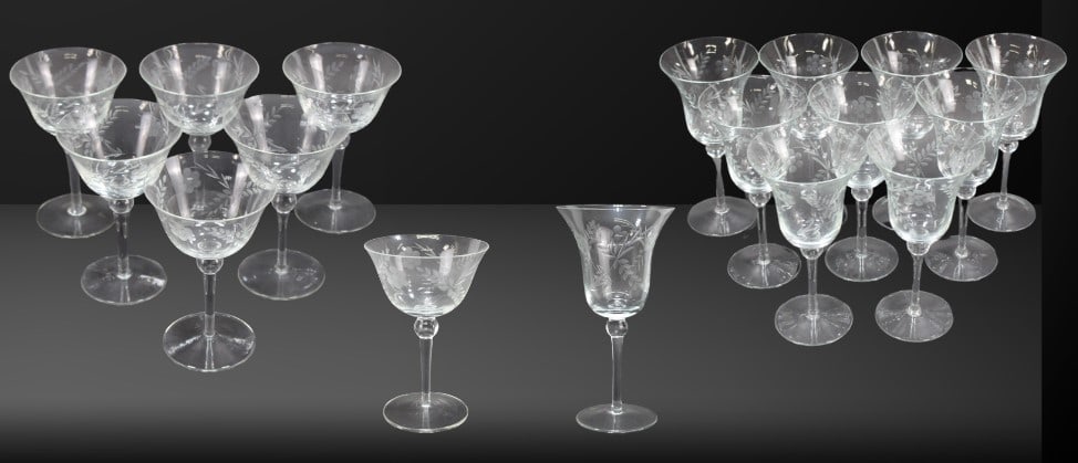 Elegant Etched Crystal Glassware Collection -...: Goblets, Champagne, and Cocktail Stems. Beautiful vintage crystal stemware set featuring delicate floral etchings on each glass. The collection includes a variety of goblets, wine glasses, and cocktai