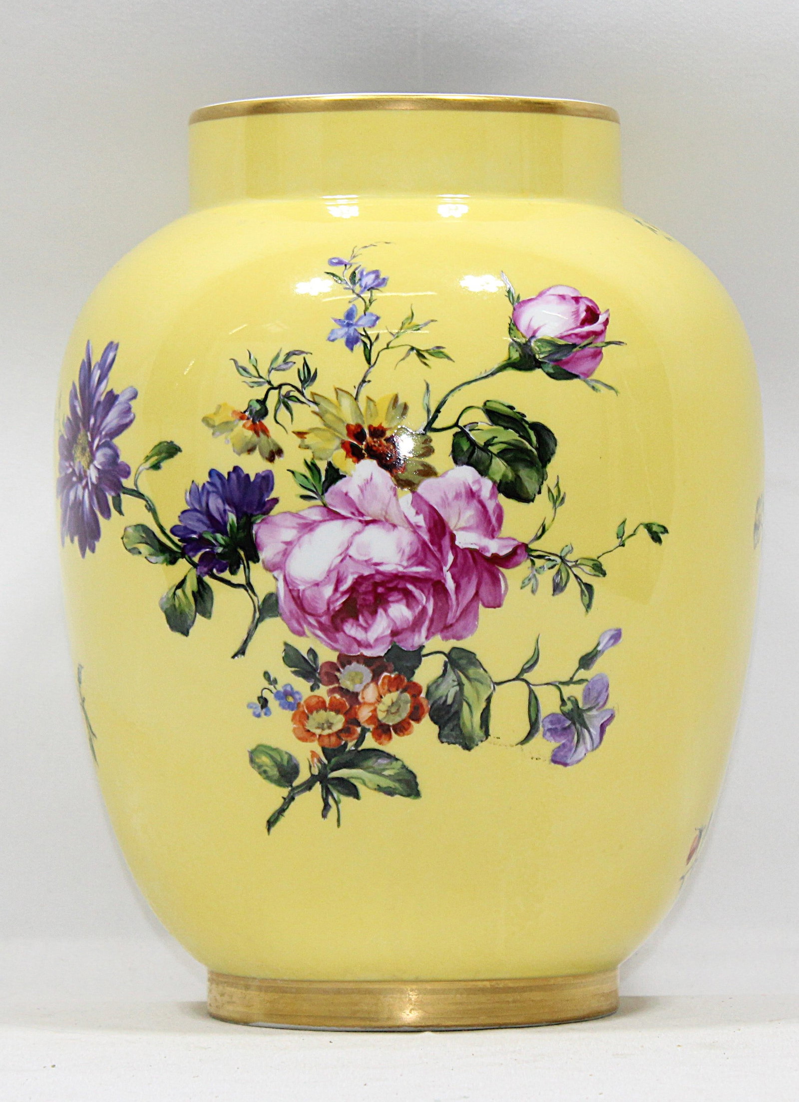 Hand-Painted Yellow Floral Porcelain Vase with...: Gold Accents - Classic Home Decor. Stunning vintage yellow porcelain vase featuring a vibrant hand-painted floral design with roses, daisies, and lush greenery. The piece is accented with a glossy gol