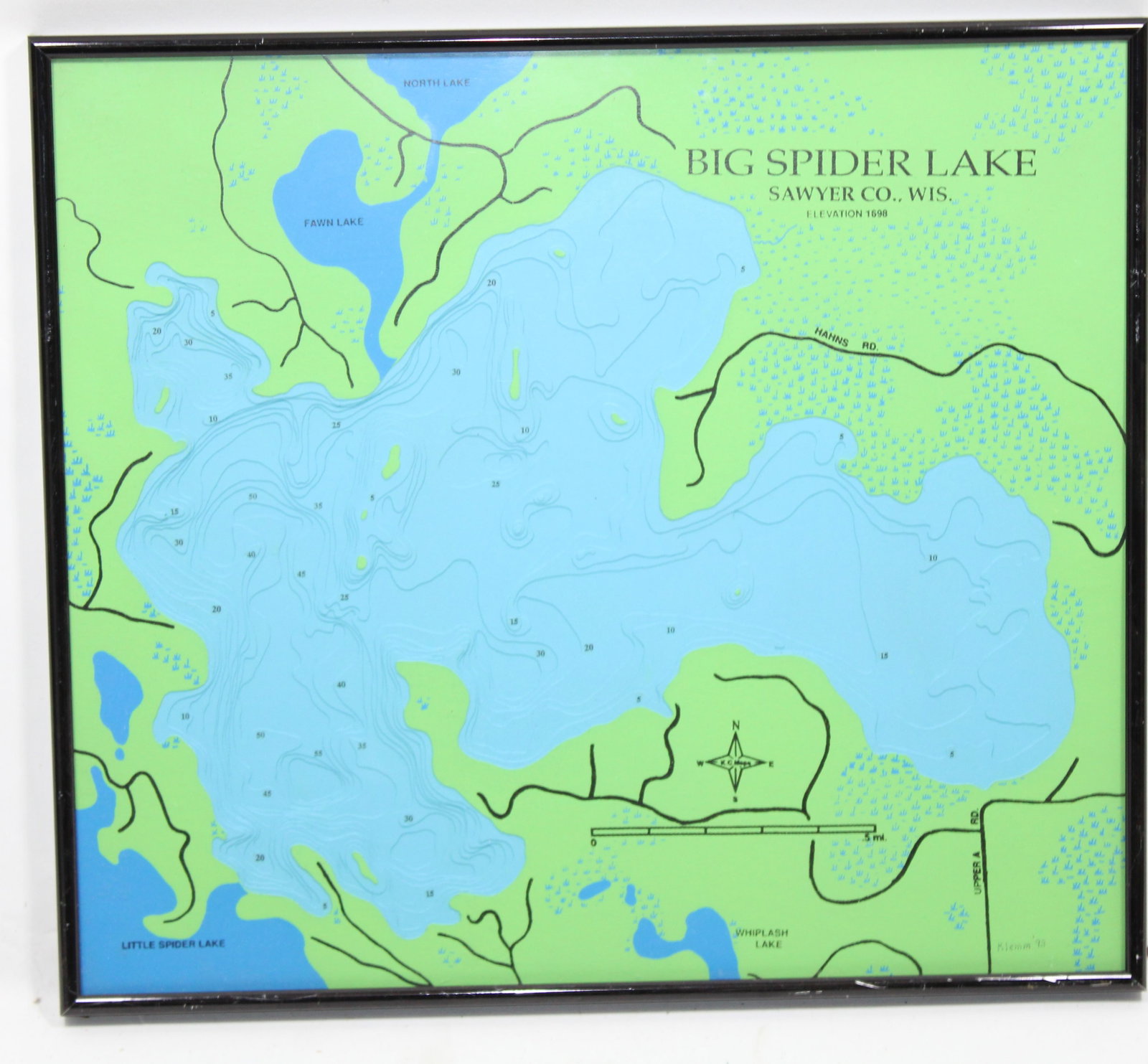Framed Big Spider Lake Map - Sawyer County,...: Wisconsin. Detailed map of Big Spider Lake in Sawyer County, Wisconsin, beautifully framed for display. Showcasing the lake's elevation of 1688 ft and surrounding features, the map includes contour li
