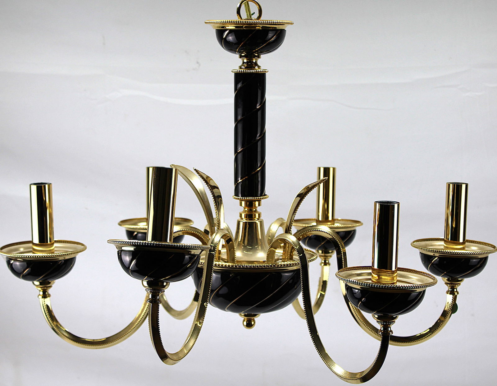 Hollywood Regency Style Chandelier: A Hollywood Regency Style Chandelier Mid/late 20th-century, Italian, manufactured by F. Fabbian, nine branches in brass with sweeping elegant curves and black enamelled detailing. H600 D800mm