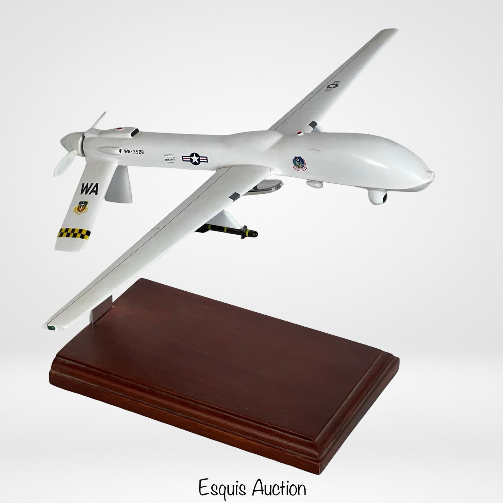 MQ-1 Predator UAV Desktop Model by eModels: Highly detailed desktop model of the MQ-1 Predator UAV, the renowned unmanned aerial vehicle used for reconnaissance and combat missions. Manufactured by EModel Airplanes, this precision-crafted repli