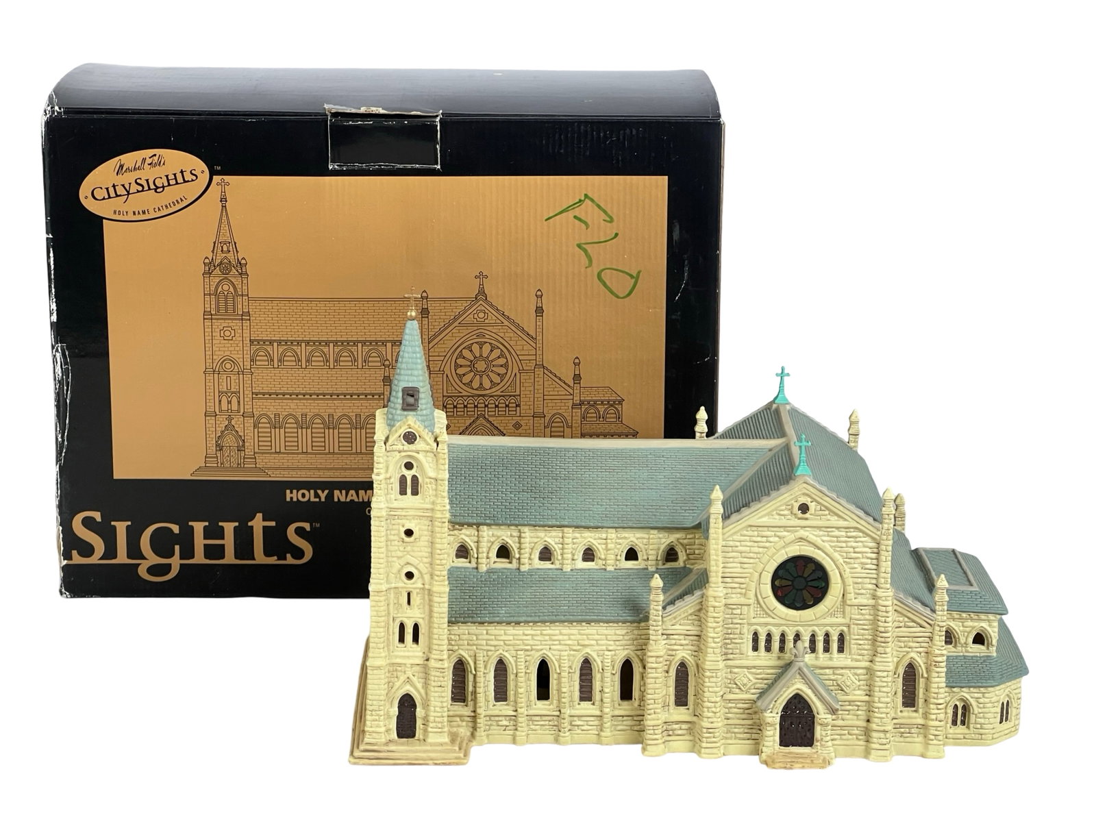 Marshall Field's Holy Name Cathedral Lighted Displ: This intricately crafted Holy Name Cathedral collectible is part of Marshall Field's CitySights series, celebrating iconic landmarks. The lighted display showcases stunning Gothic architectural detail