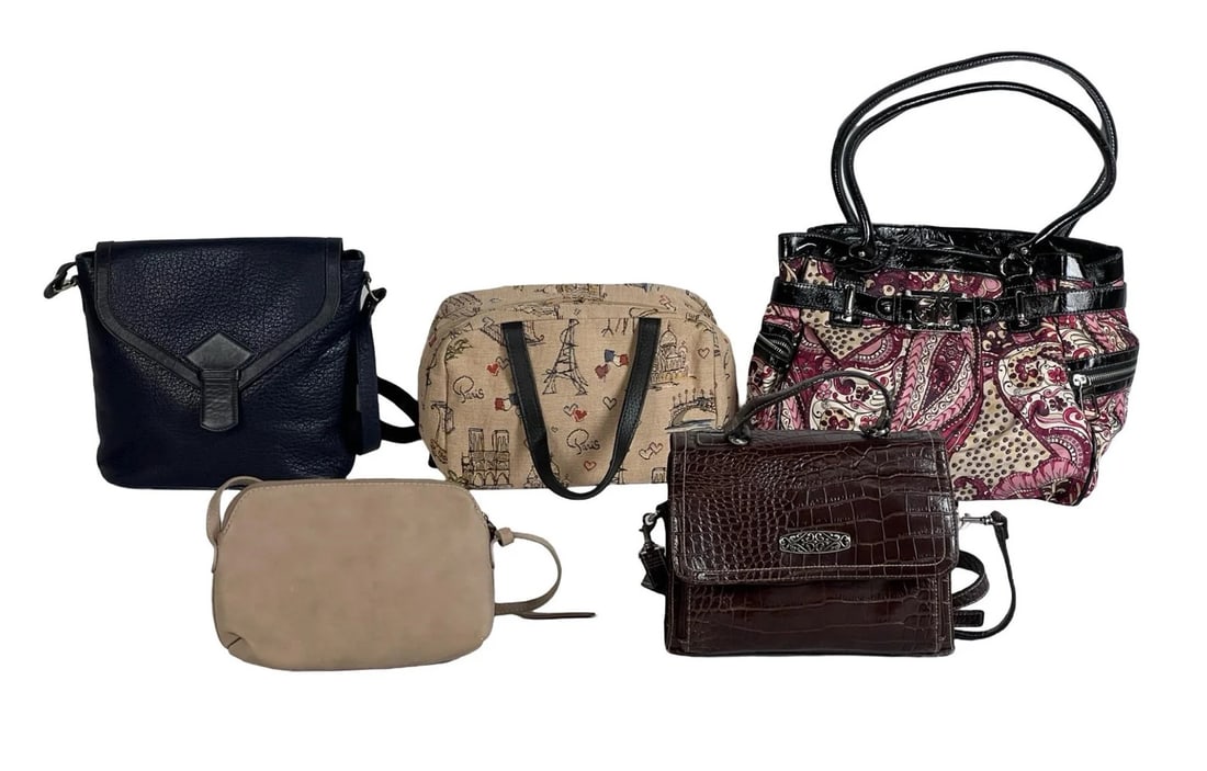 Group of Fashion Lady's Handbags and Wallets: This lot features a diverse selection of handbags and wallets in various styles and materials. Included are handbags such as a chic black crossbody bag, a whimsical Paris-themed canvas bag, and a pais