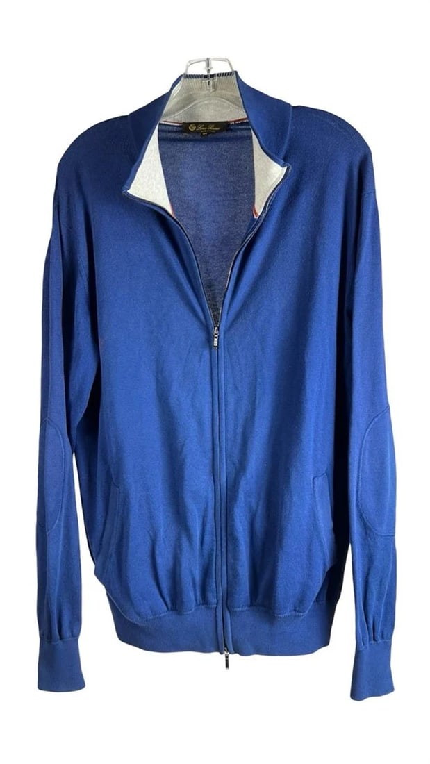 Loro Piana Blue Zip-Up Men's Cardigan: This elegant Loro Piana cardigan showcases a refined zip-up style, crafted from premium 100% cotton in Italy. Featuring a vibrant blue color, it offers a relaxed fit with ribbed cuffs and hem, along w