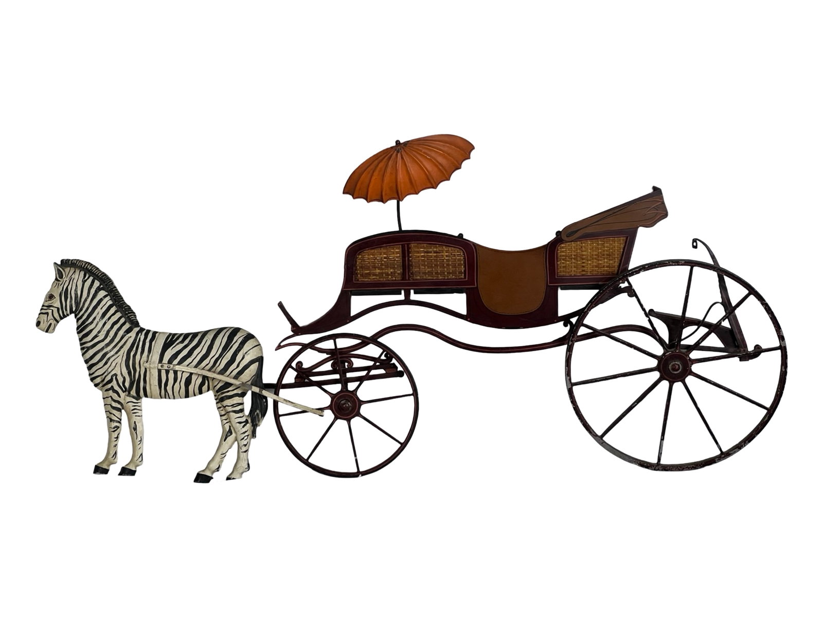 Mottahedeh Metal Wall Sculpture- Zebra & Carriage: This intricately crafted metal wall sculpture features a detailed zebra and an elegant carriage, designed by Mottahedeh and made in Italy. The sculpture showcases a vintage-style carriage with woven p