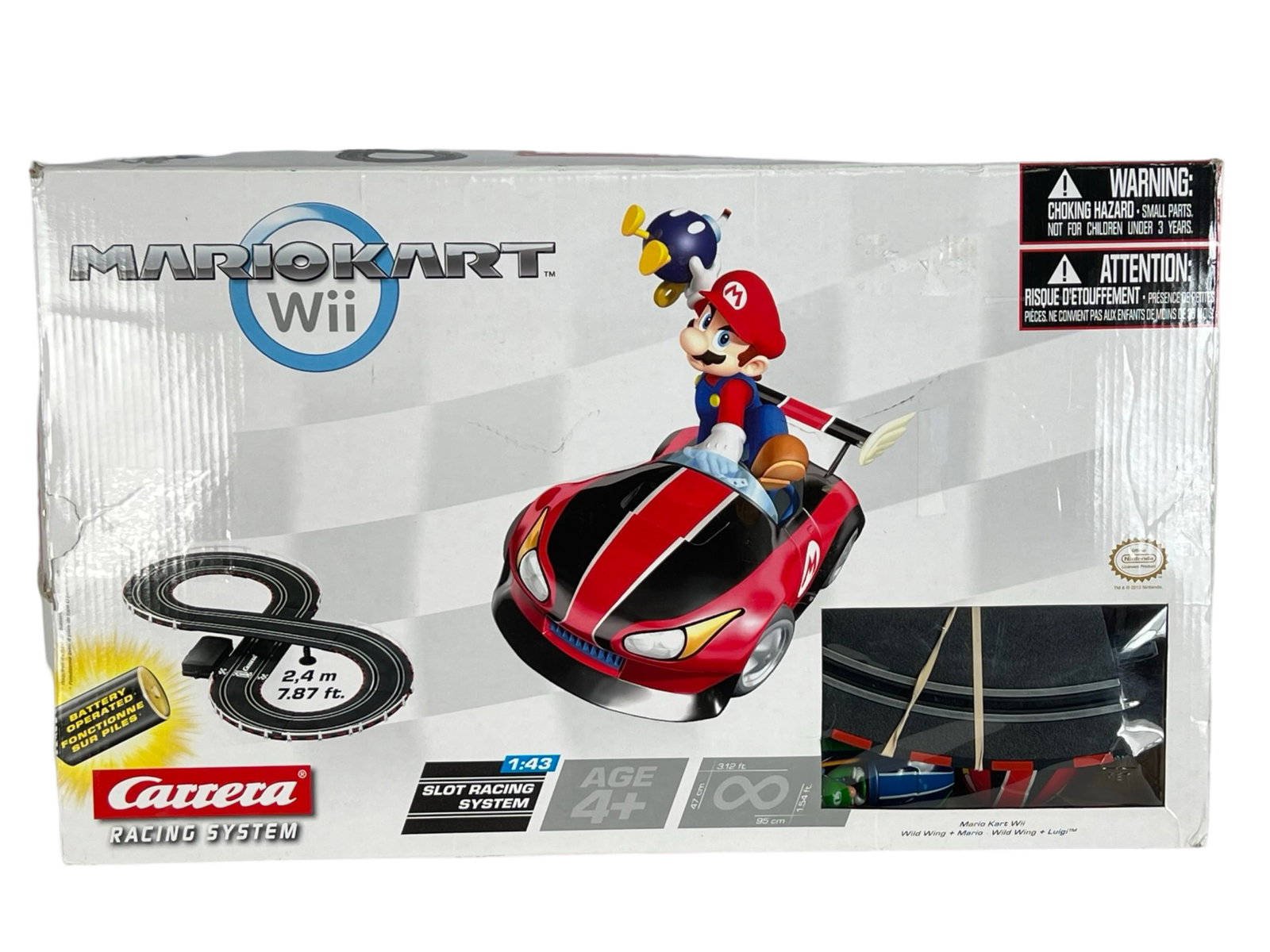 Carrera Mario Kart Wii Slot Car Racing System: Pre-owned Carrera Mario Kart Wii Slot Car Racing System in good overall condition. This set features an exciting slot car racing experience with beloved Mario and Luigi characters in their signature W
