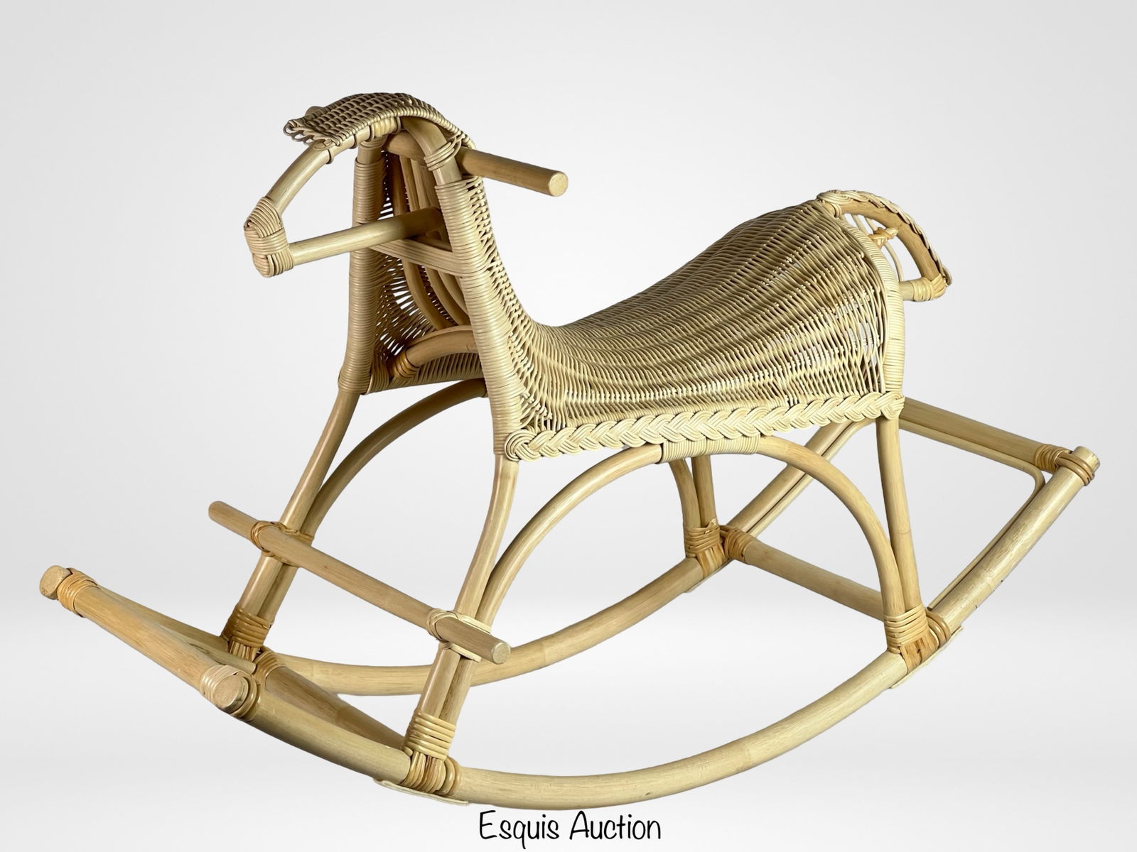 Franco Albini Style Rattan & Bamboo Rocking Horse: Beautifully crafted in the style of Franco Albini, this vintage rattan and bamboo rocking horse is a charming addition to any space. Its handwoven details and sturdy frame make it both a decorative pi