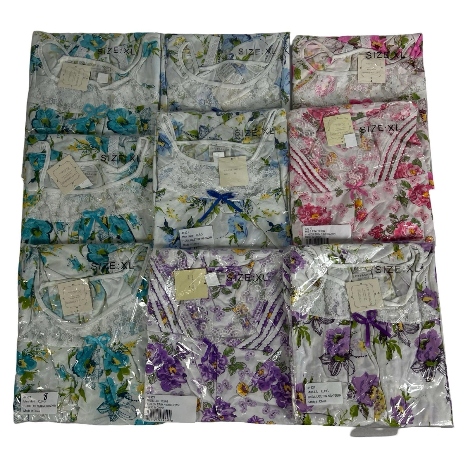 Bulk Lot Miss Lilac Floral Lace Trim Nightgowns: Lot of 10 Miss Lilac floral lace trim nightgowns, size XL, all new with tags. Includes:2 Miss Pink2 Miss Bluff3 Miss Mint3 Miss LilacMint-near mint condition. Please review photos for details.