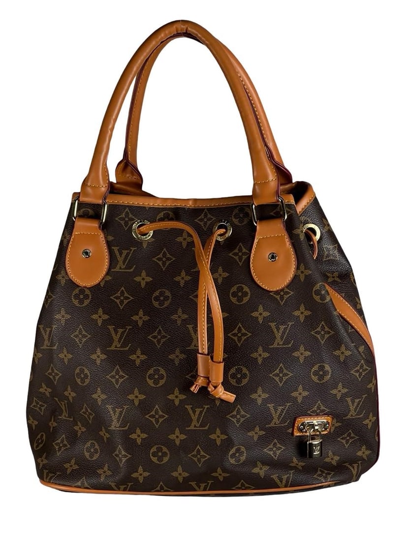 Canvas Monogram Neo Bucket Bag: Stylish canvas monogram Neo bucket bag, featuring a spacious interior and a classic design. Measures 12" x 16".PLEASE NOTE: This item is being sold simply as a bag, without reference to any brand.Good