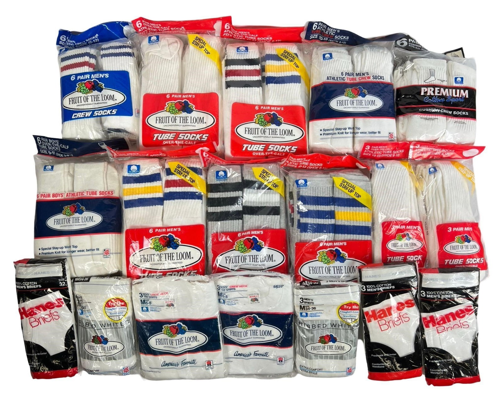 New Old Stock Men's & Boys' Socks, Shirts, Briefs: Lot of new old stock men's and boys' socks, shirts, and briefs in various sizes and styles. Unopened and unworn, ideal for personal use or resale. Mint-near mint condition. Please review photos for de
