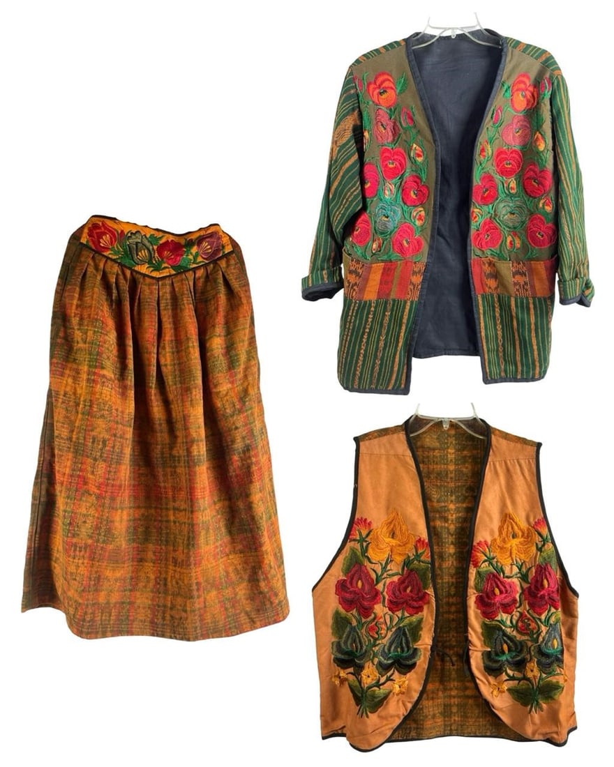 Ladies Floral Embroidered Jacket & Skirt Set: Elegant ladies' clothing set in a brownish-orange hue, featuring delicate embroidered floral designs. Includes: Jacket Skirt Overall shirtGood overall condition.