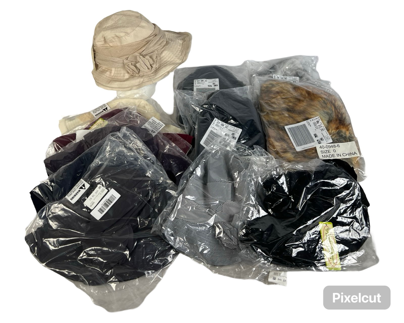 12 Jeanne Simmons & Faux Fur Ladies Hats: 12 stylish hats, featuring a mix of Jeanne Simmons floral designs and faux fur stylesNew condition.