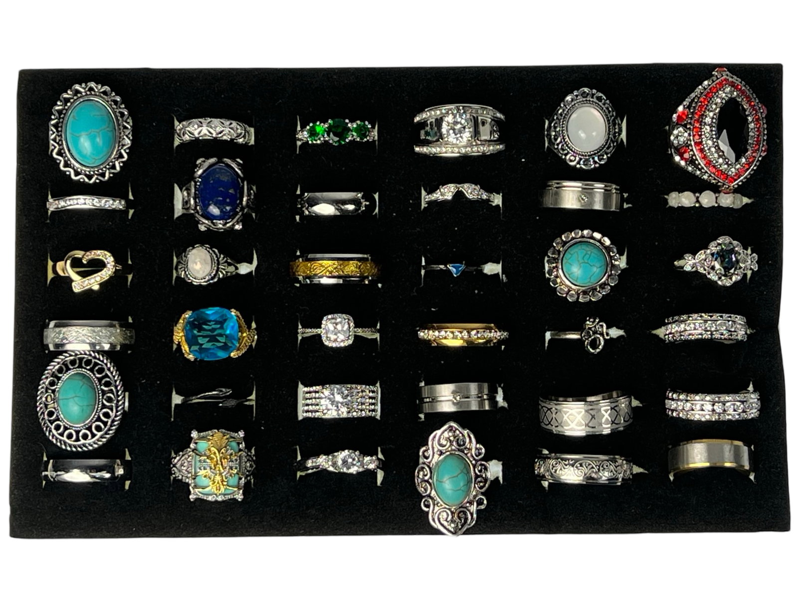 Exquisite Collection: Set of 36 Various Rings: Embark on a journey through diverse styles and eras with this stunning collection of 36 rings, each possessing its own unique charm and character. From timeless classics to contemporary statement piec