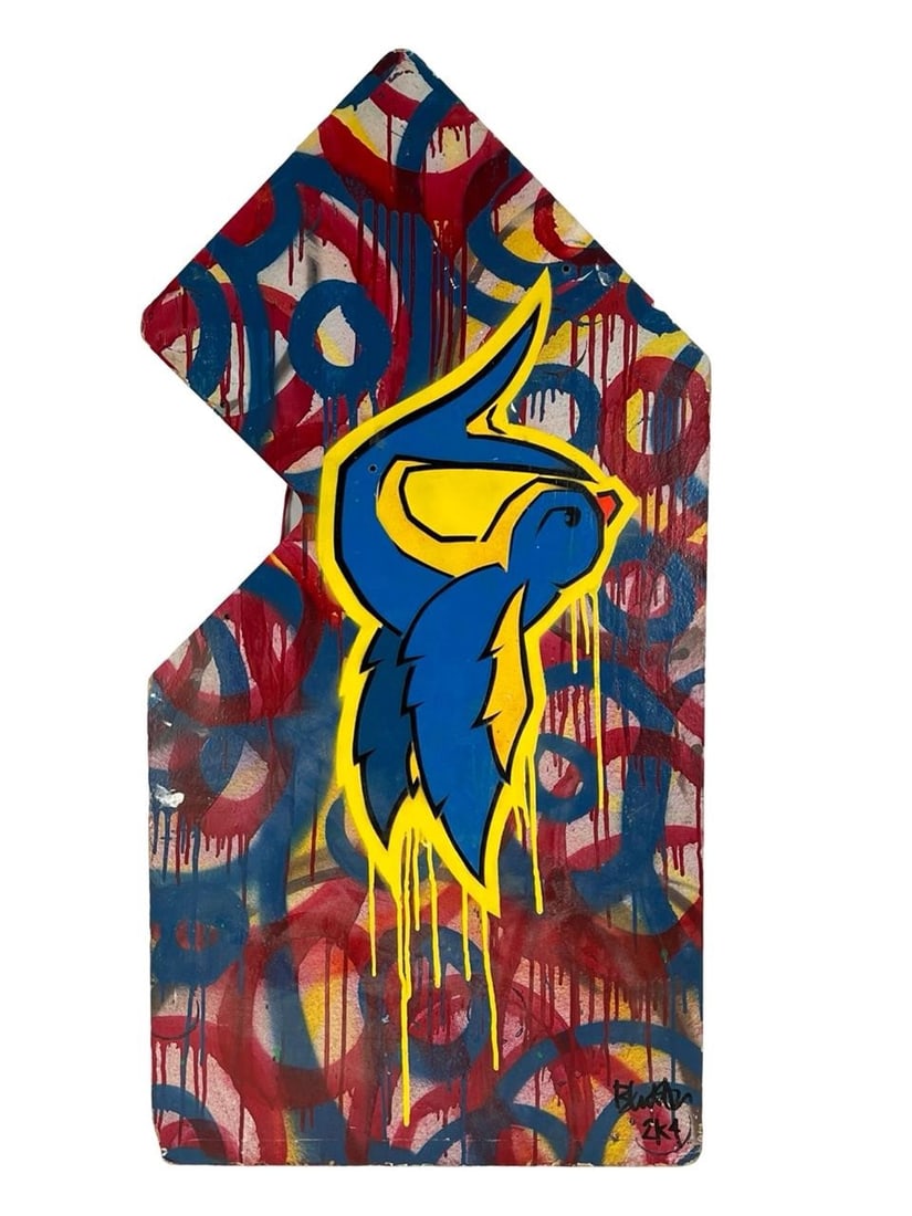 Urban Contemporary Street Graffiti Art Painting: Vibrant contemporary street art painting on an irregularly shaped wood board featuring bold layered spray paint patterns in red, blue, and yellow with a central stylized graphic element outlined in bl