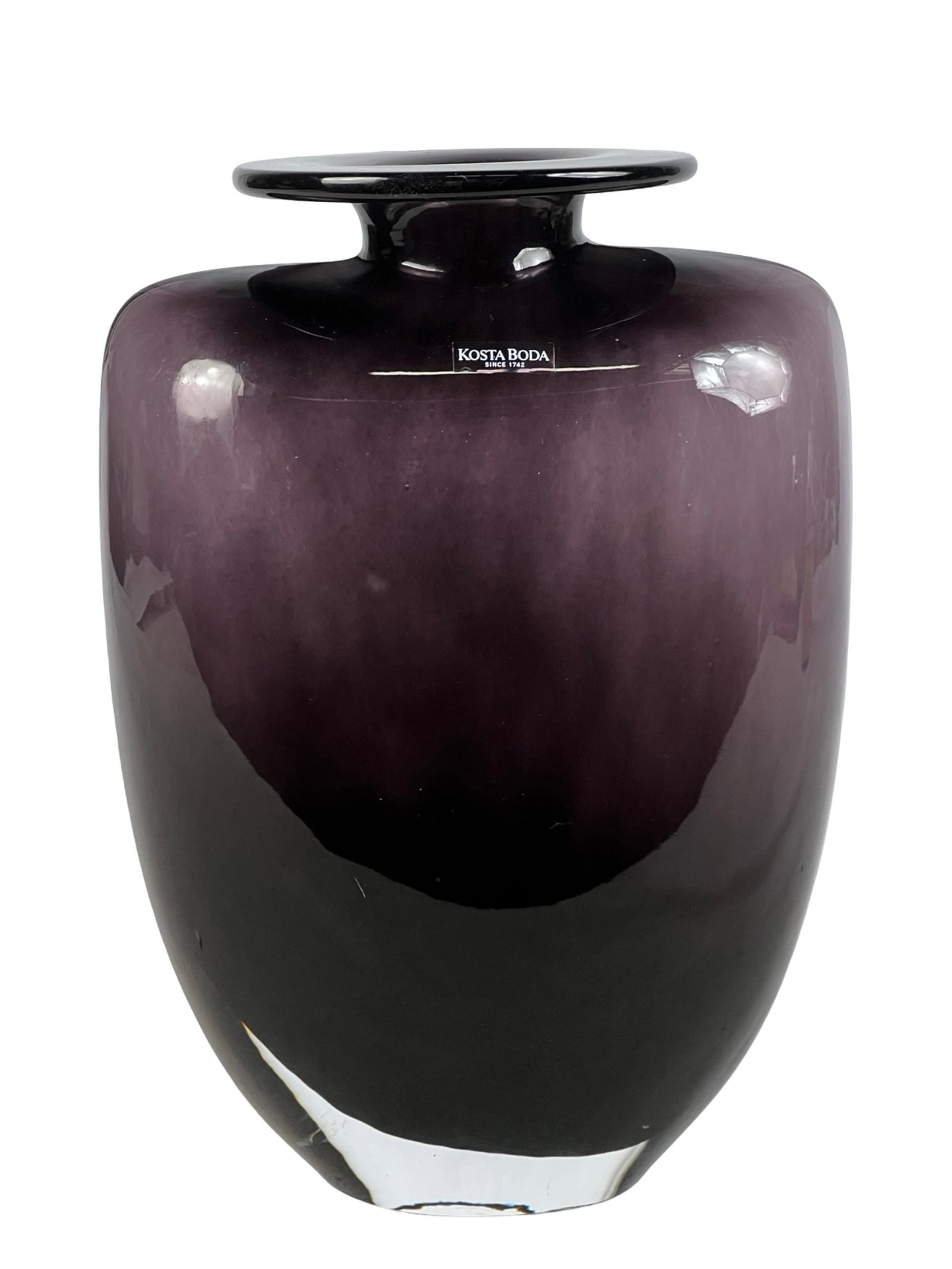 Kosta Boda "Swing" Art Glass Vase by Kjell Engman: Elegant art glass vase from the celebrated "Swing" series designed by Kjell Engman for Kosta Boda, Sweden. This handblown piece features a striking gradient from deep plum to black, with a wide, flare