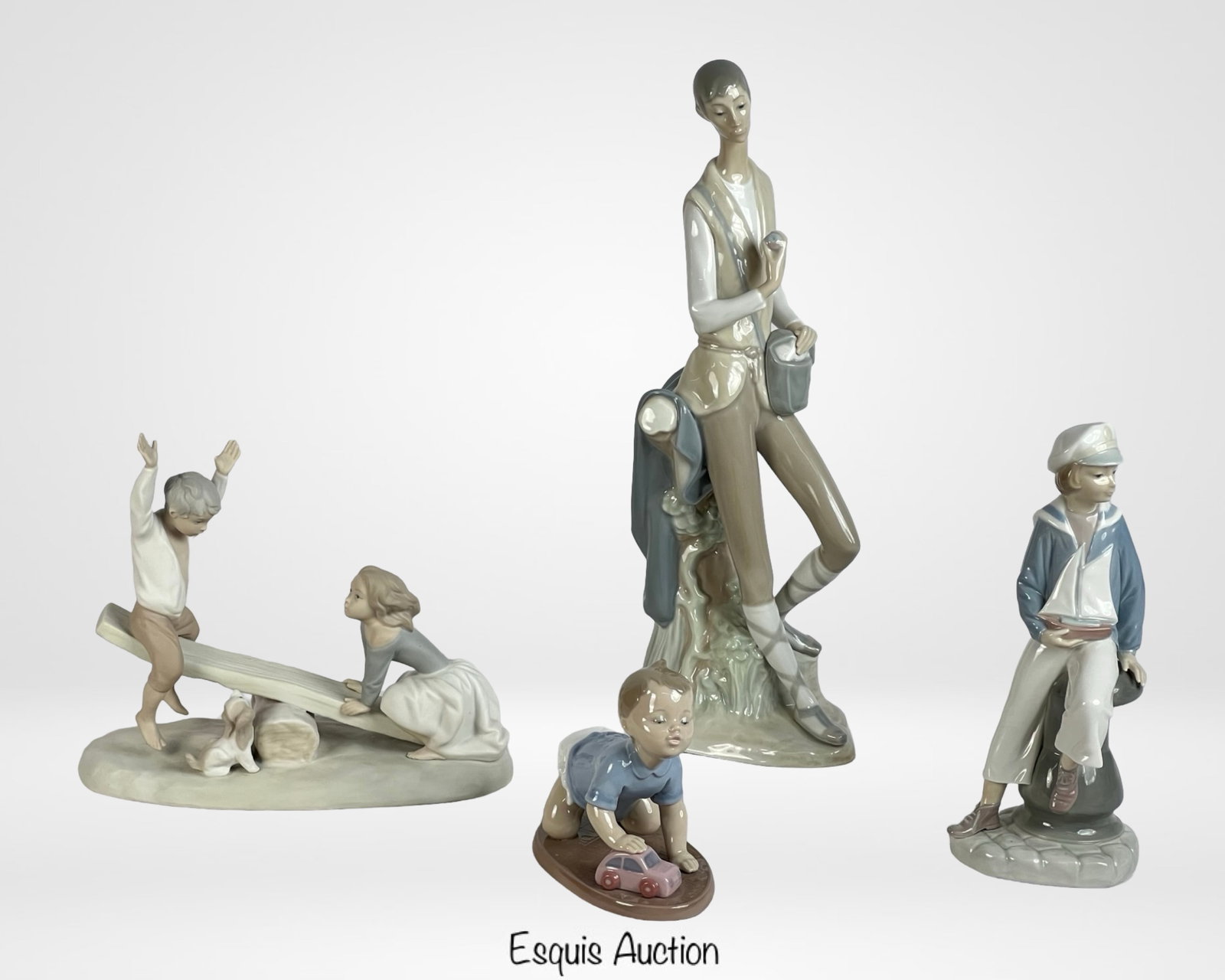 Lladro & Nao Porcelain Figurines Lot: Collection of five Spanish porcelain figurines by Lladro and Nao, ranging in height from approx. 15" to 4.5". Very good overall condition. No visible cracks or repairs. Glaze clean and lustrous.