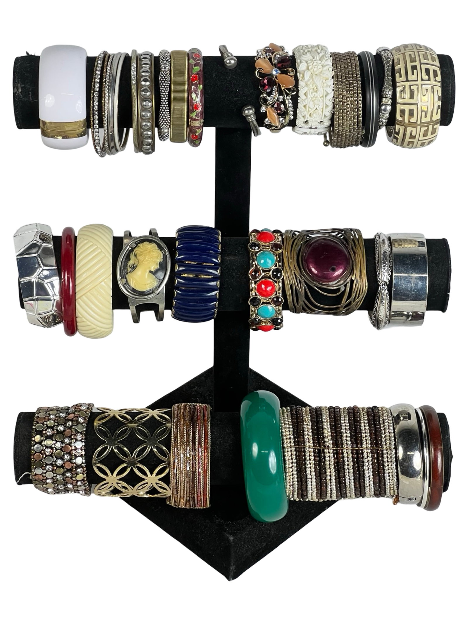 Collection of Lady's Bracelets: Explore a diverse assortment of bracelets, each one offering its own unique style and charm. Display stands are not included.