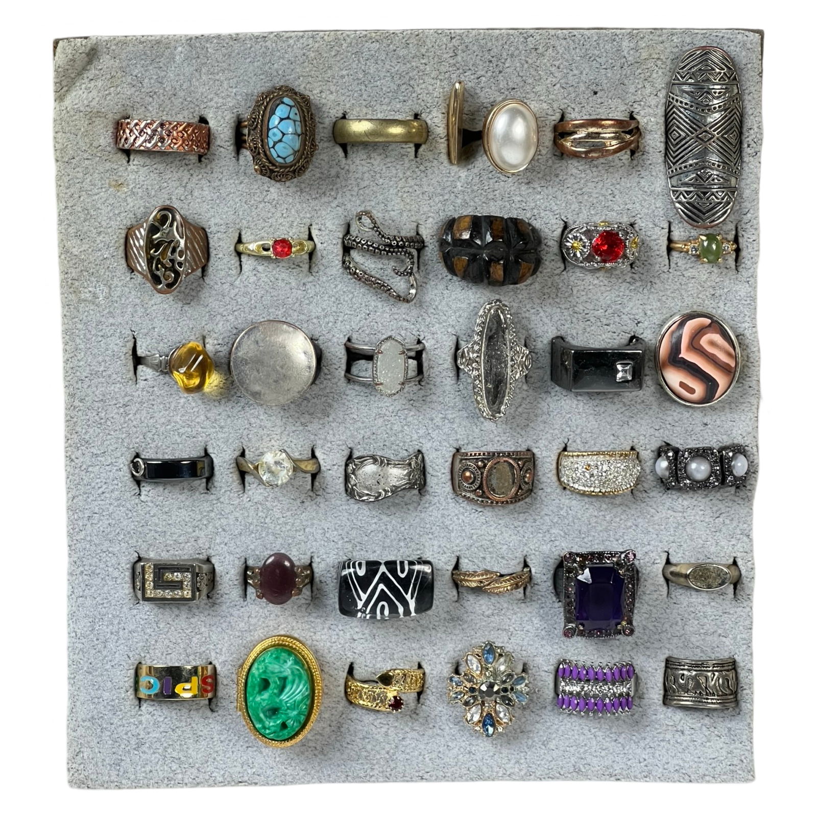 Exquisite Collection: Set of 36 Various Rings: Embark on a journey through diverse styles and eras with this stunning collection of 36 rings, each possessing its own unique charm and character. From timeless classics to contemporary statement piec