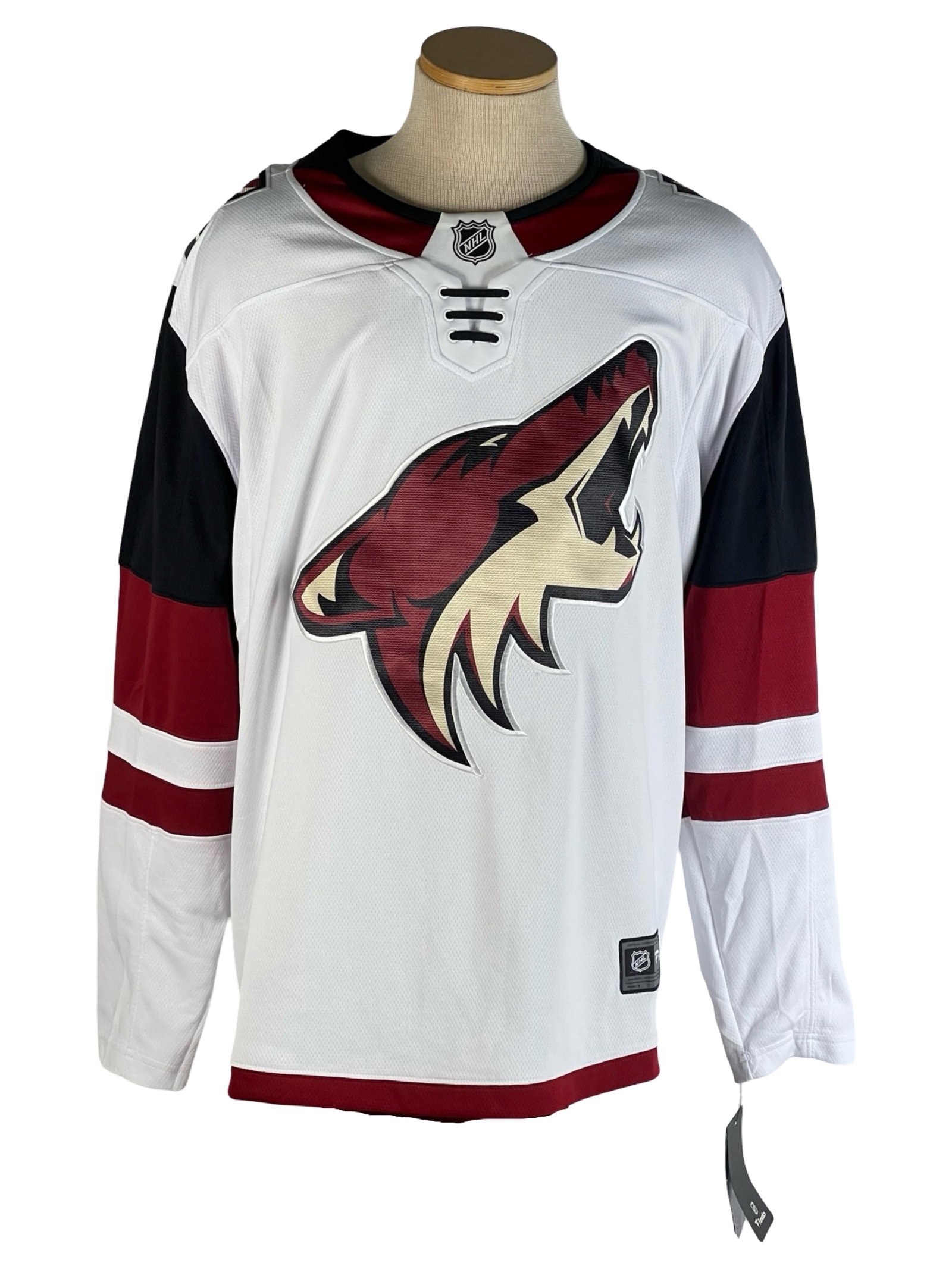 Arizona Coyotes NHL Hockey Jersey Size L New: Arizona Coyotes NHL Hockey Jersey. Size L. New. Some shelf stains on one sleeve.