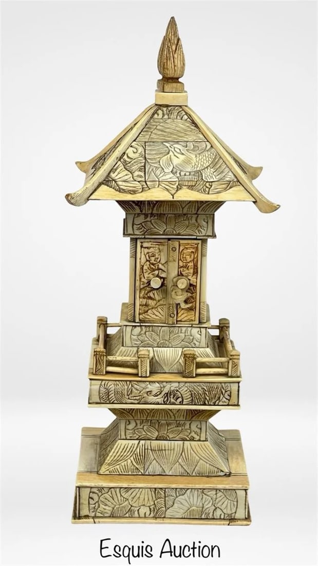 Antique Meiji Japanese Carved Zushi Shrine Pagoda: Antique late Meiji period Japanese hand-carved Zushi shrine pagoda. This intricately crafted piece features a tiered roof adorned with detailed floral and nature motifs. The central compartment houses